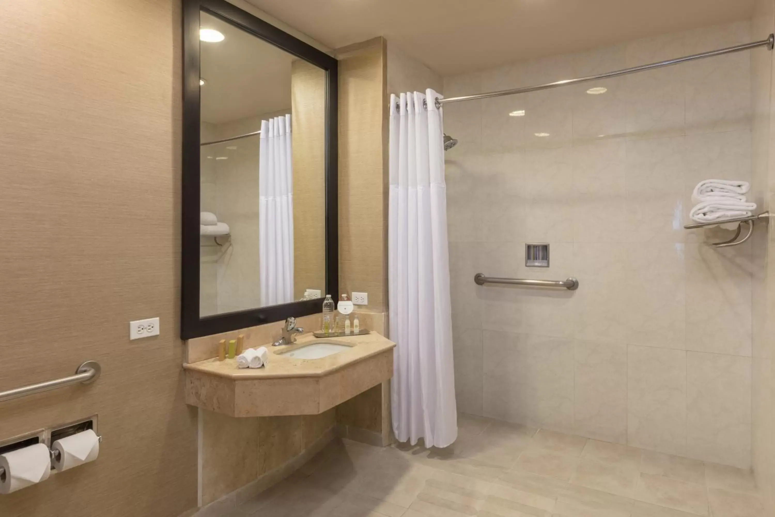 Bathroom in CoSuites Saltillo Hotel