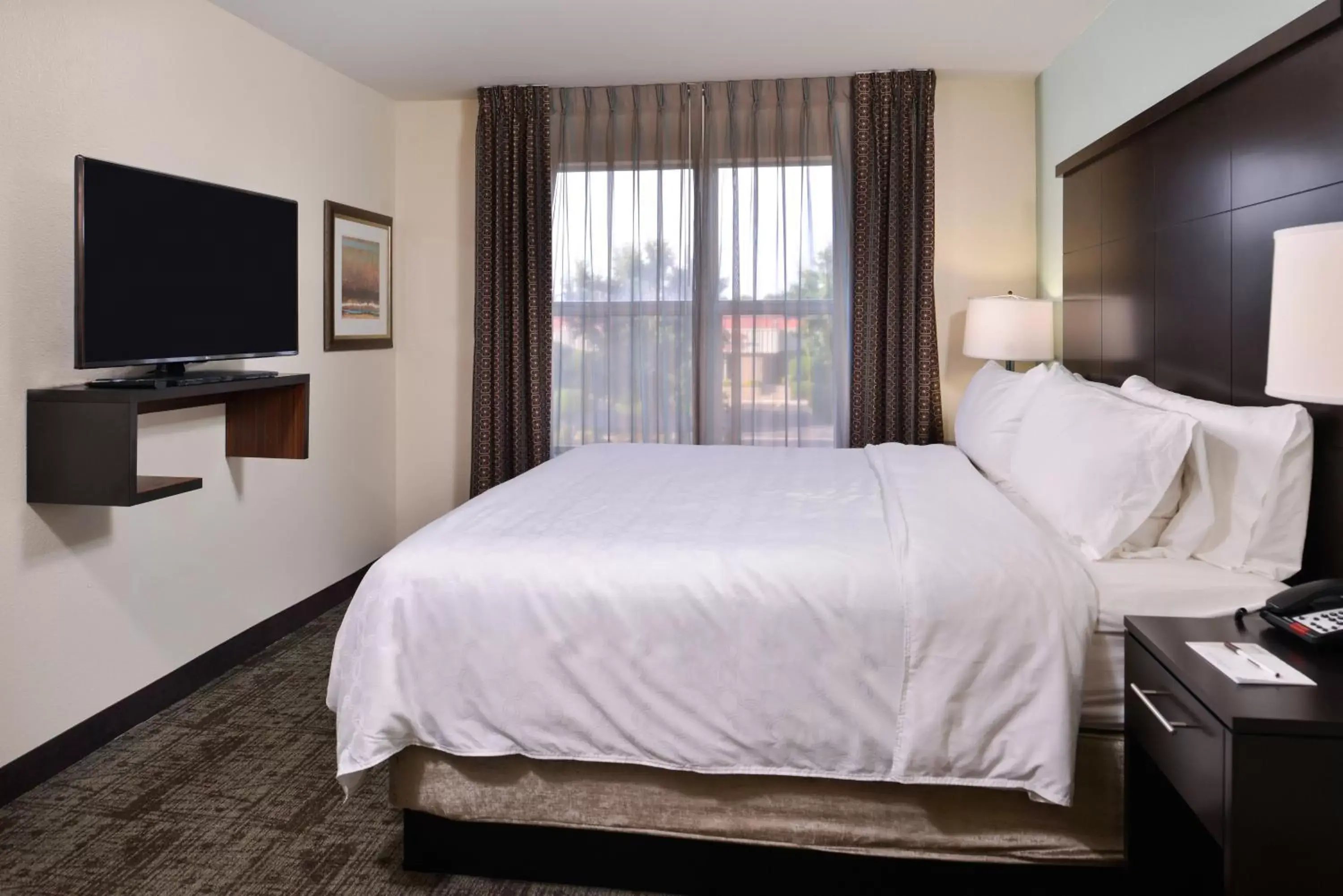 Photo of the whole room, Bed in Staybridge Suites Wichita Falls, an IHG Hotel