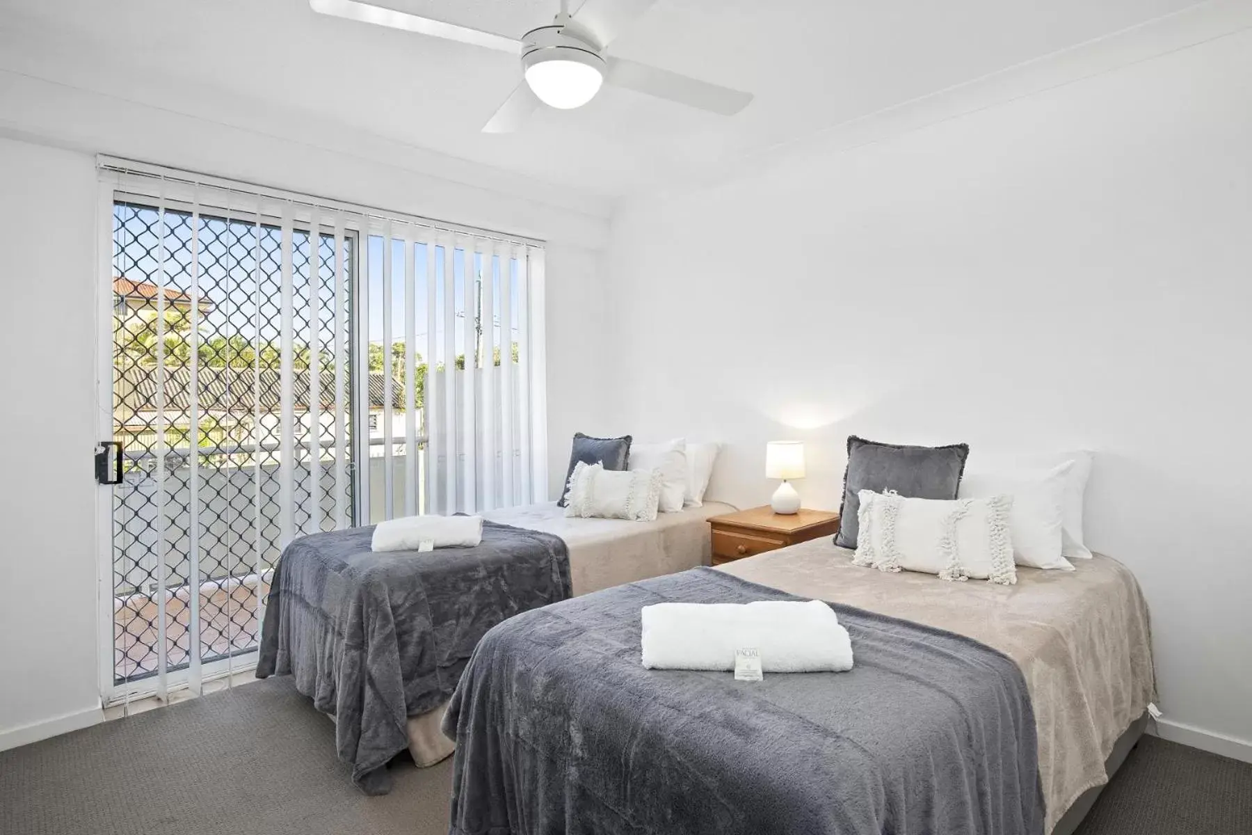 Bed in Kirra Palms Holiday Apartments