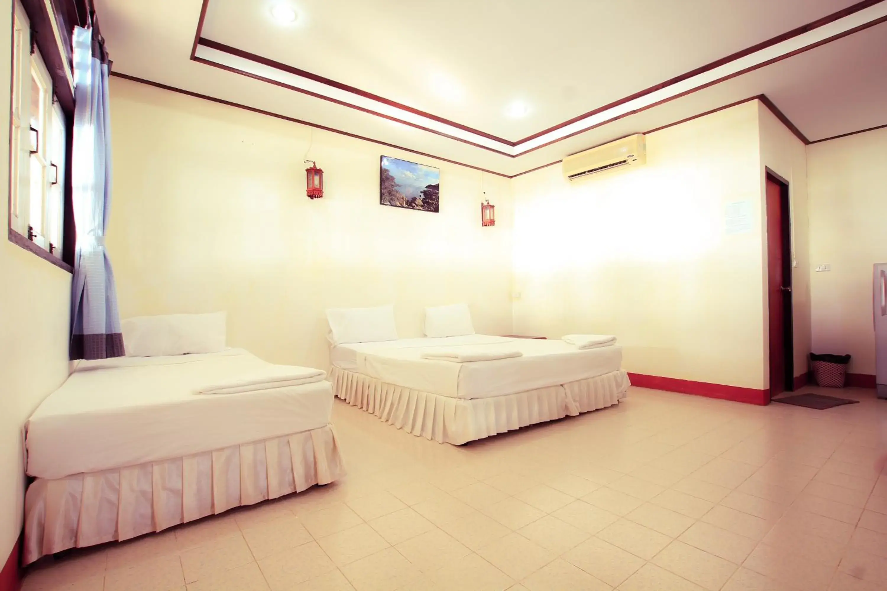 Bed in Marine Chaweng Beach Resort Bed in Marine Chaweng Beach Resort