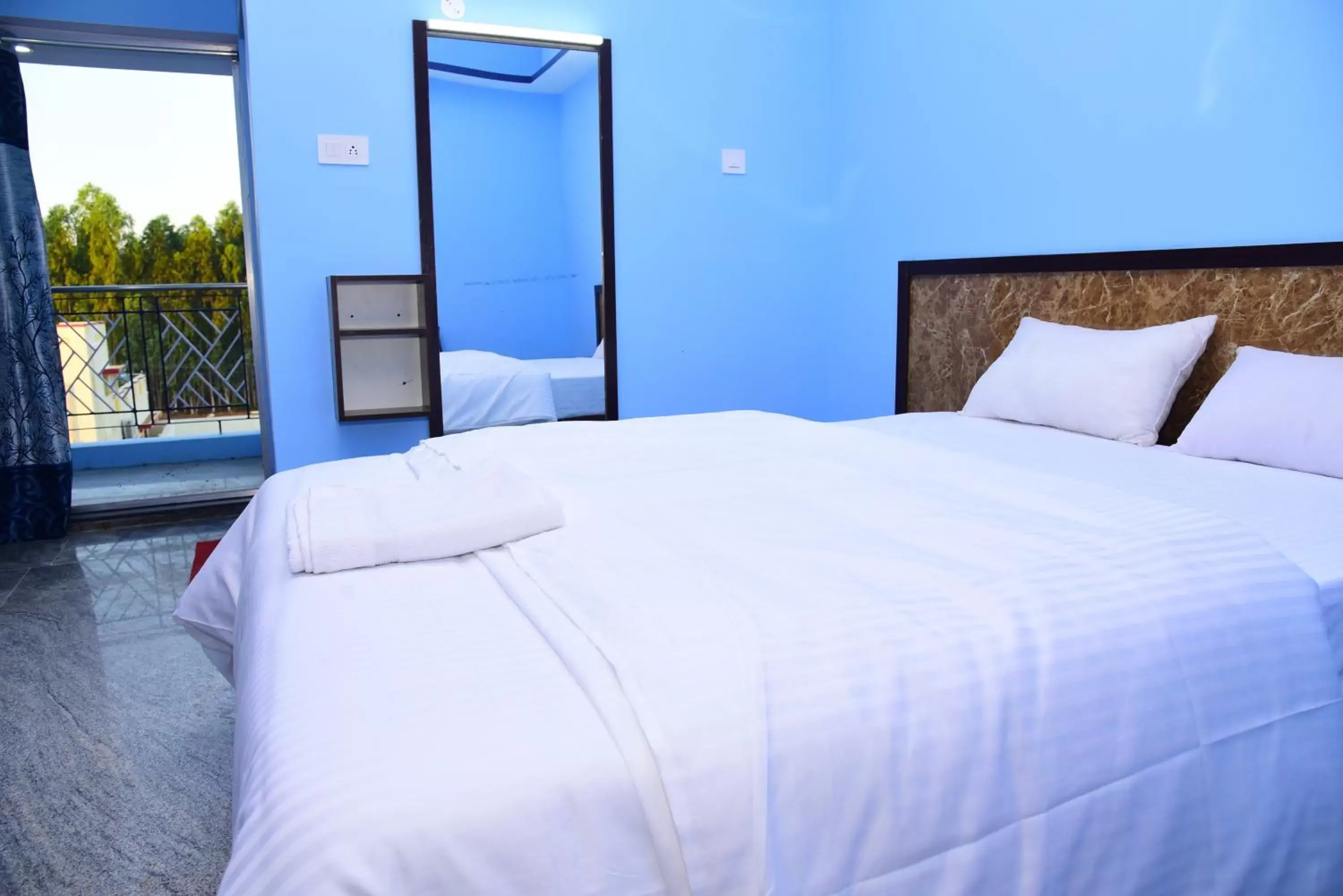 Bed in Thangam Residency Bed in Thangam Residency