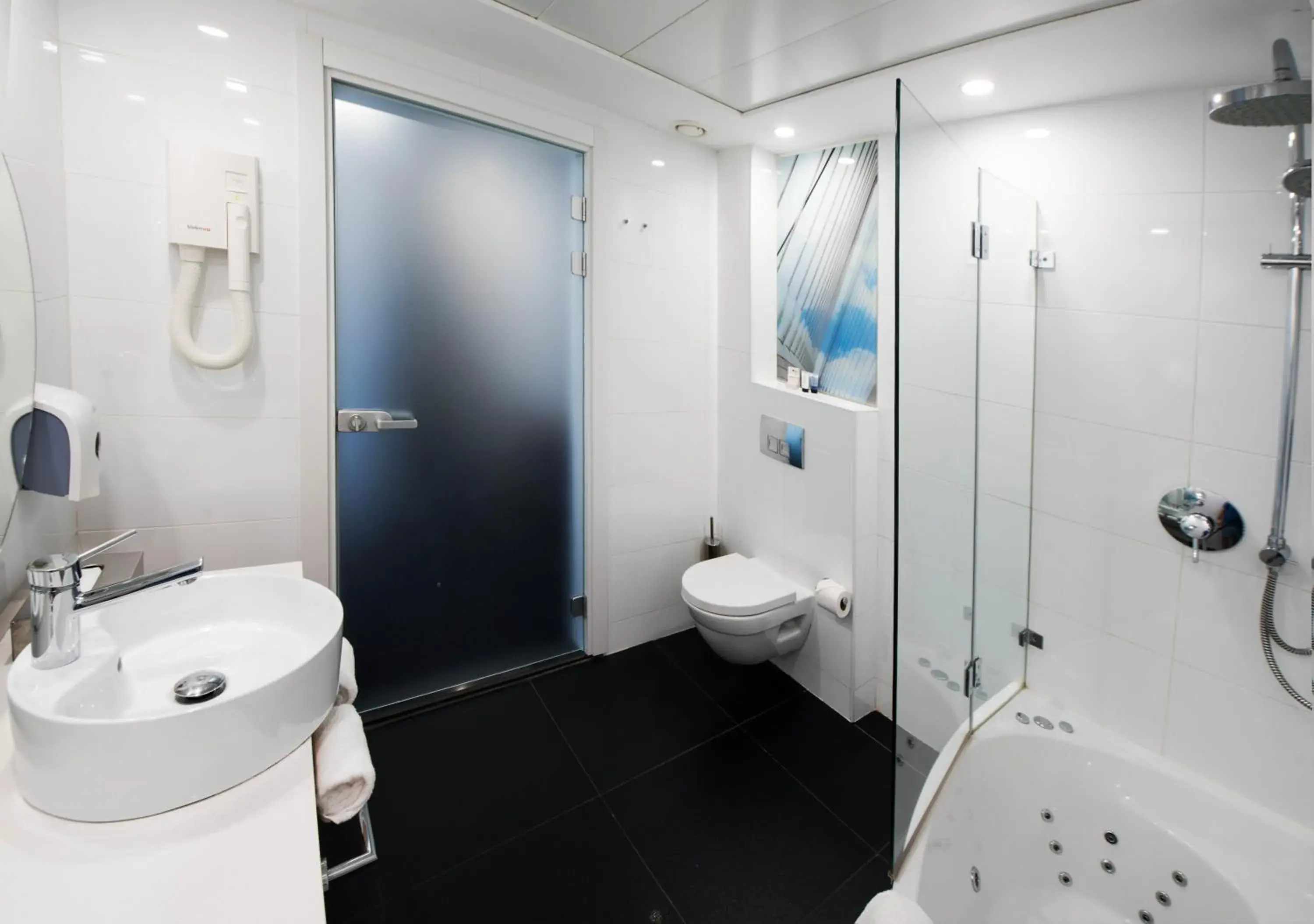 Bathroom in Eyal Hotel by Smart Hotels