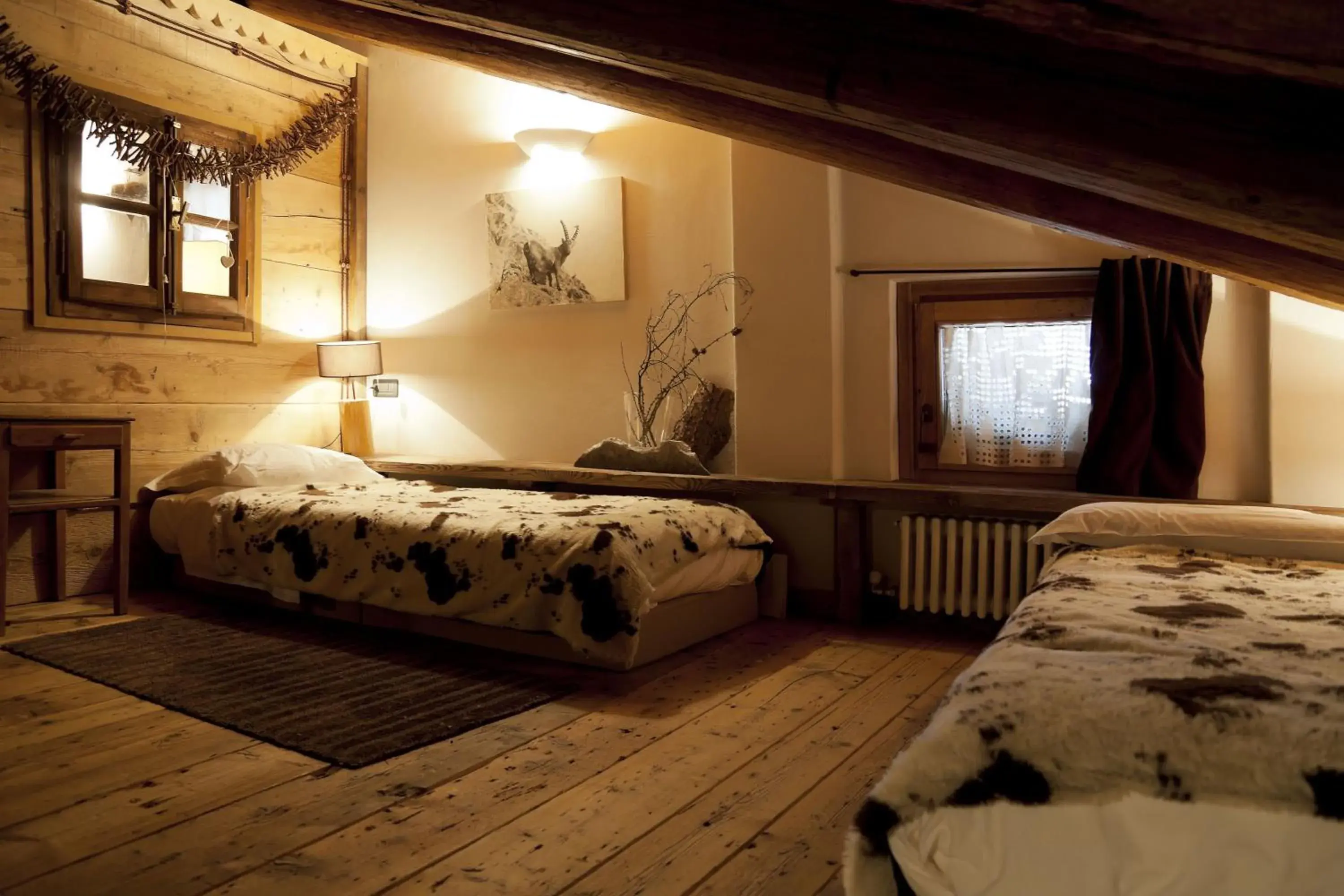 Photo of the whole room, Bed in Hotel Chalet Svizzero