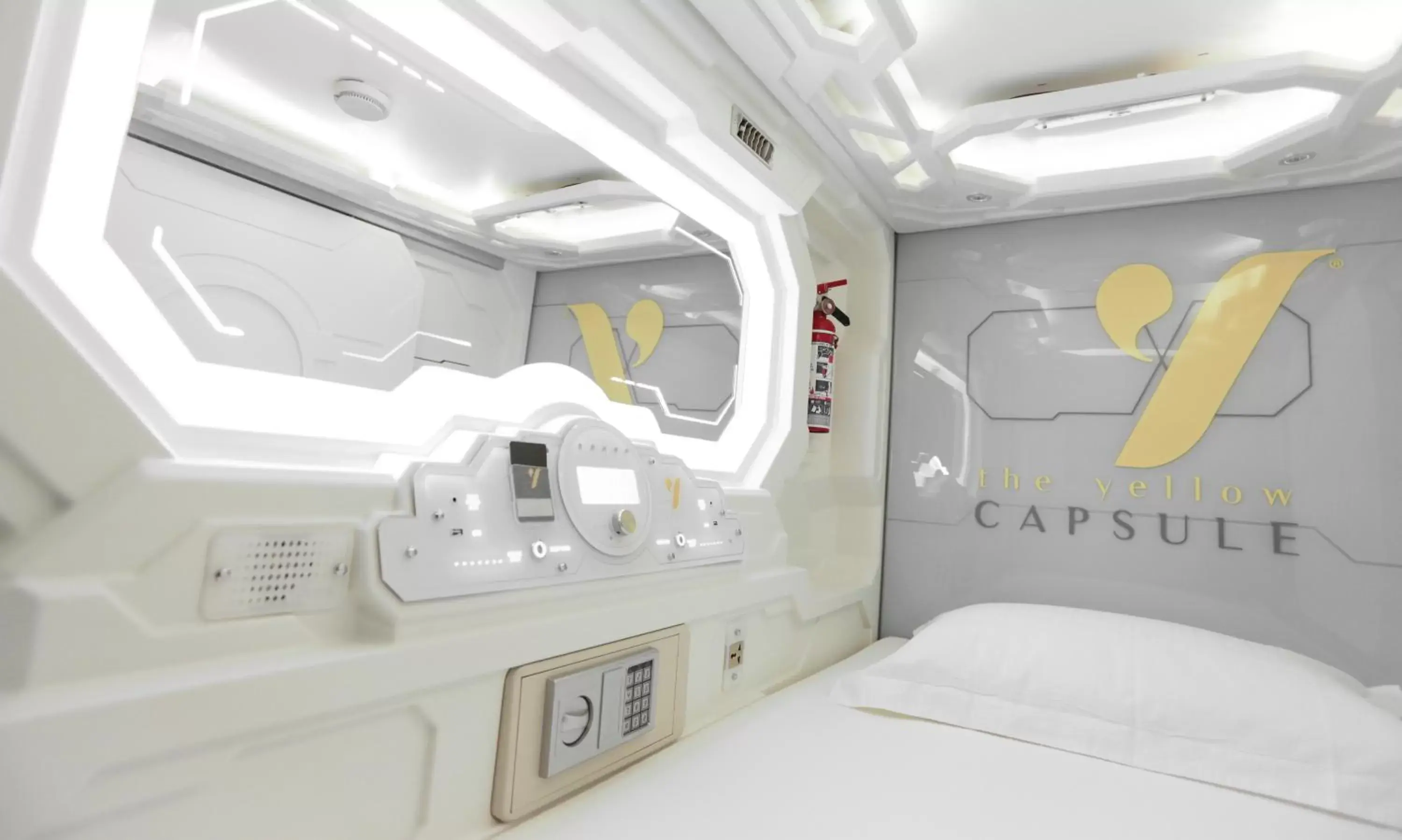 Bed in The Yellow Capsule Experience