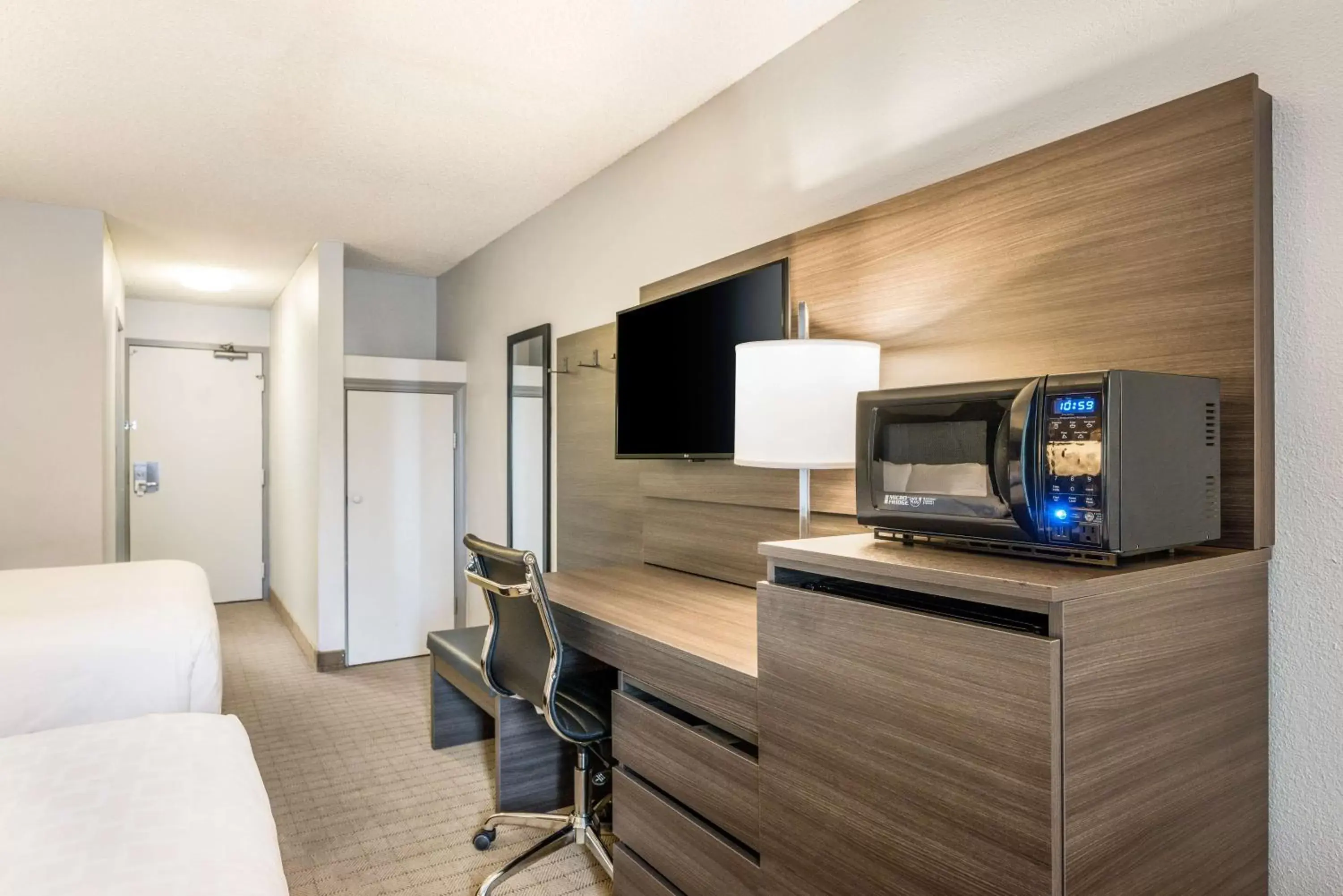 TV/Entertainment Center in SureStay Hotel by Best Western SeaTac Airport North