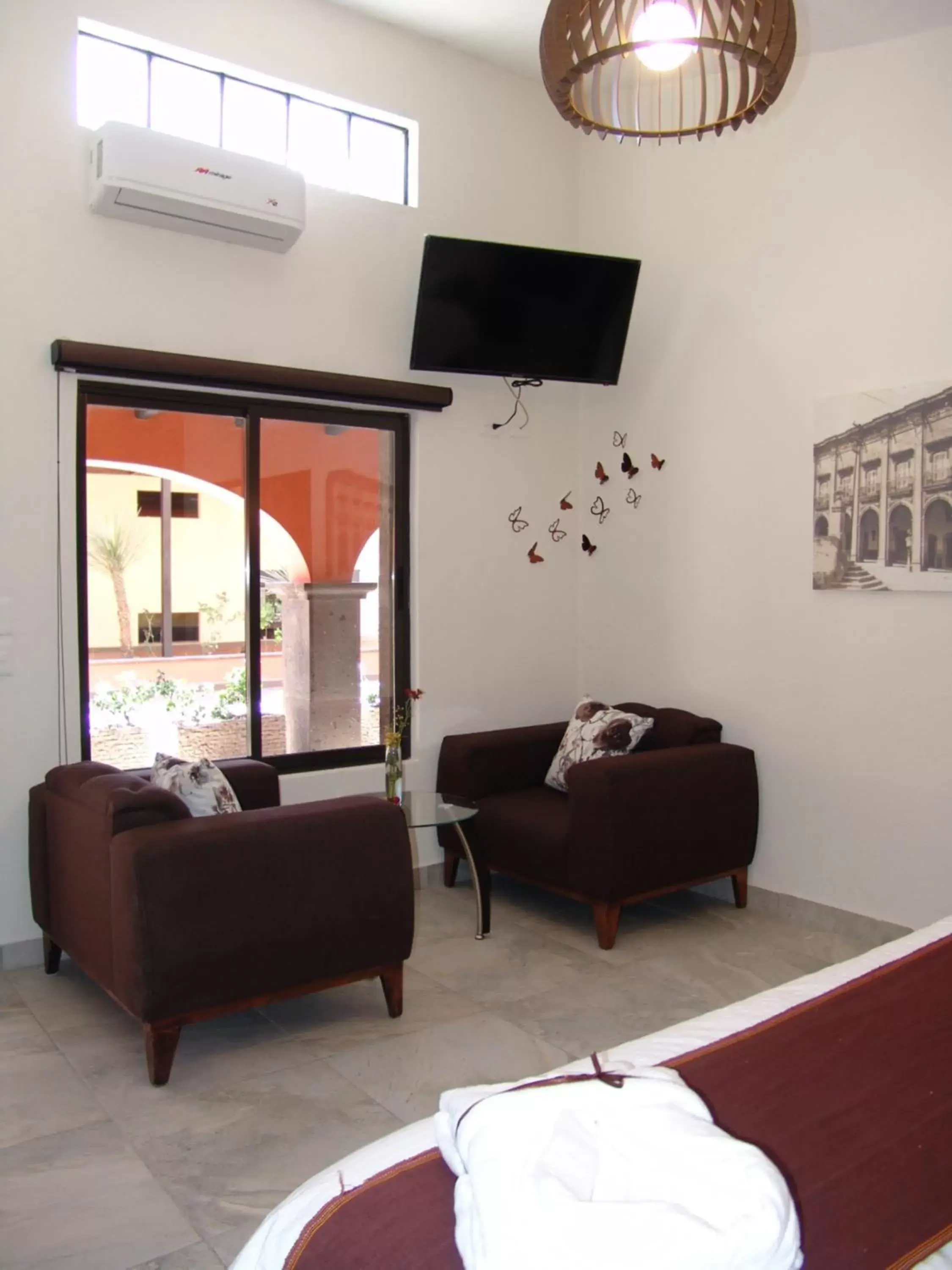 TV and multimedia, Seating Area in Hotel Casa Don Quijote
