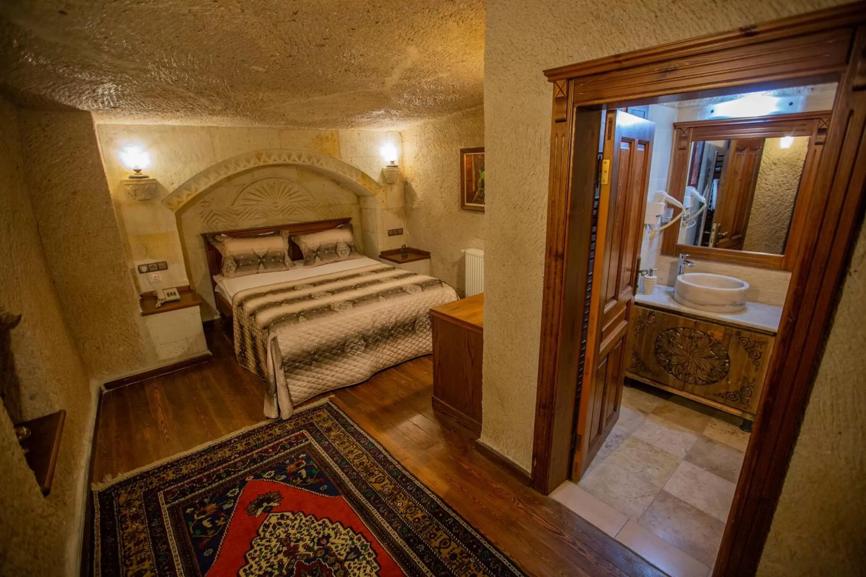 Photo of the whole room, Bathroom in Stone House Cave Hotel