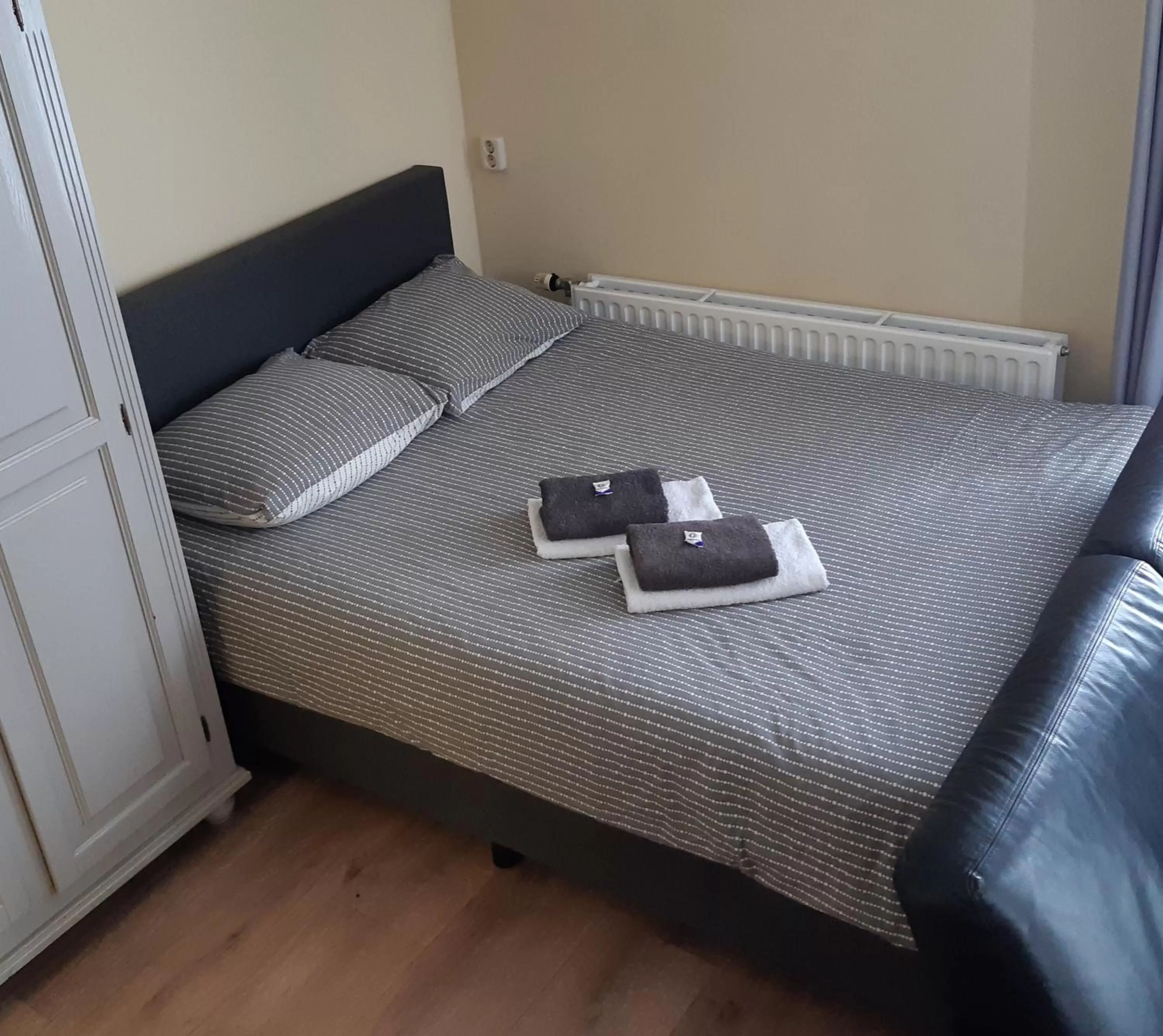 Bed in Logement 'De witte klok'