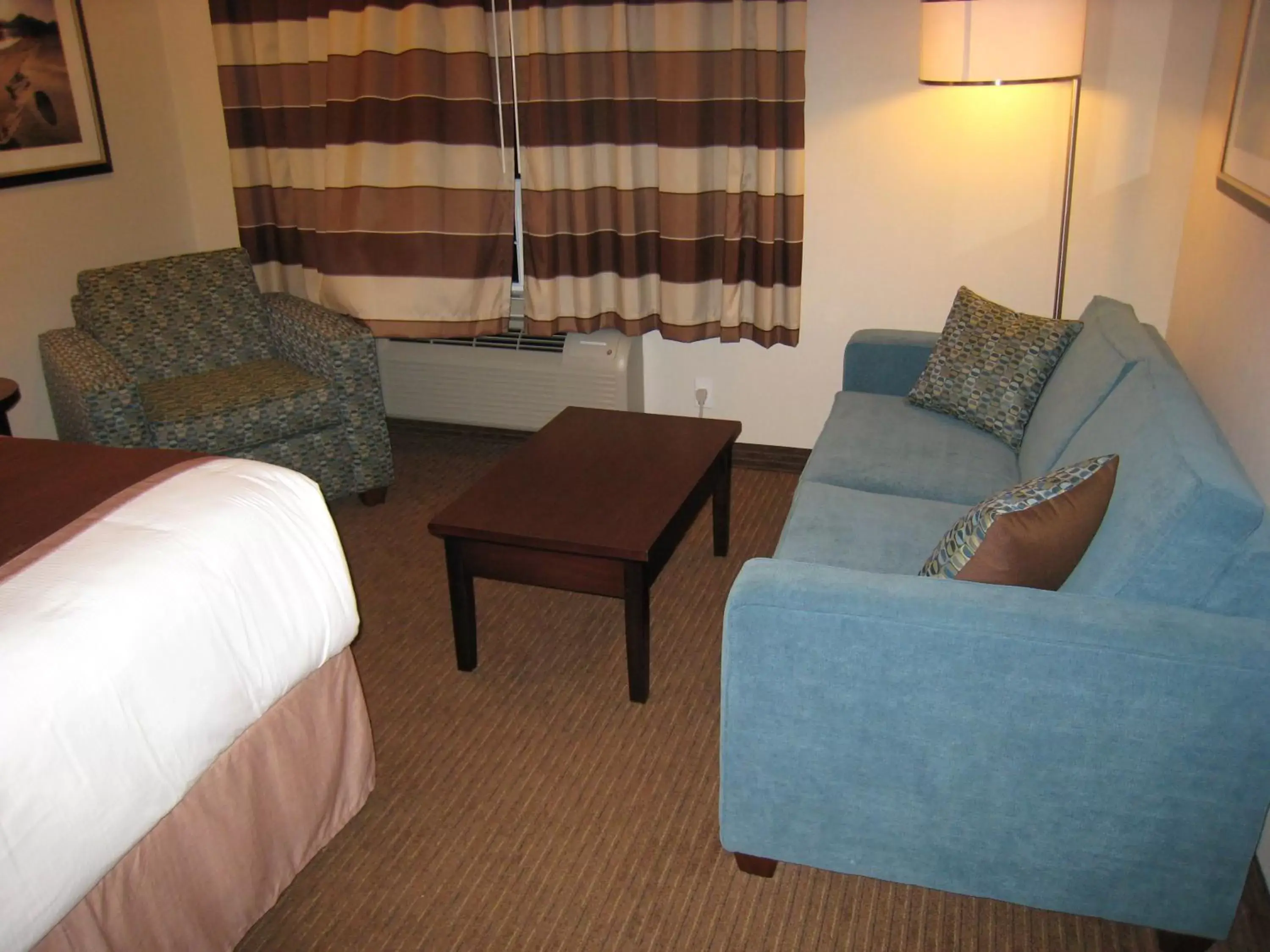 Bedroom, Seating Area in Ramada by Wyndham Creston