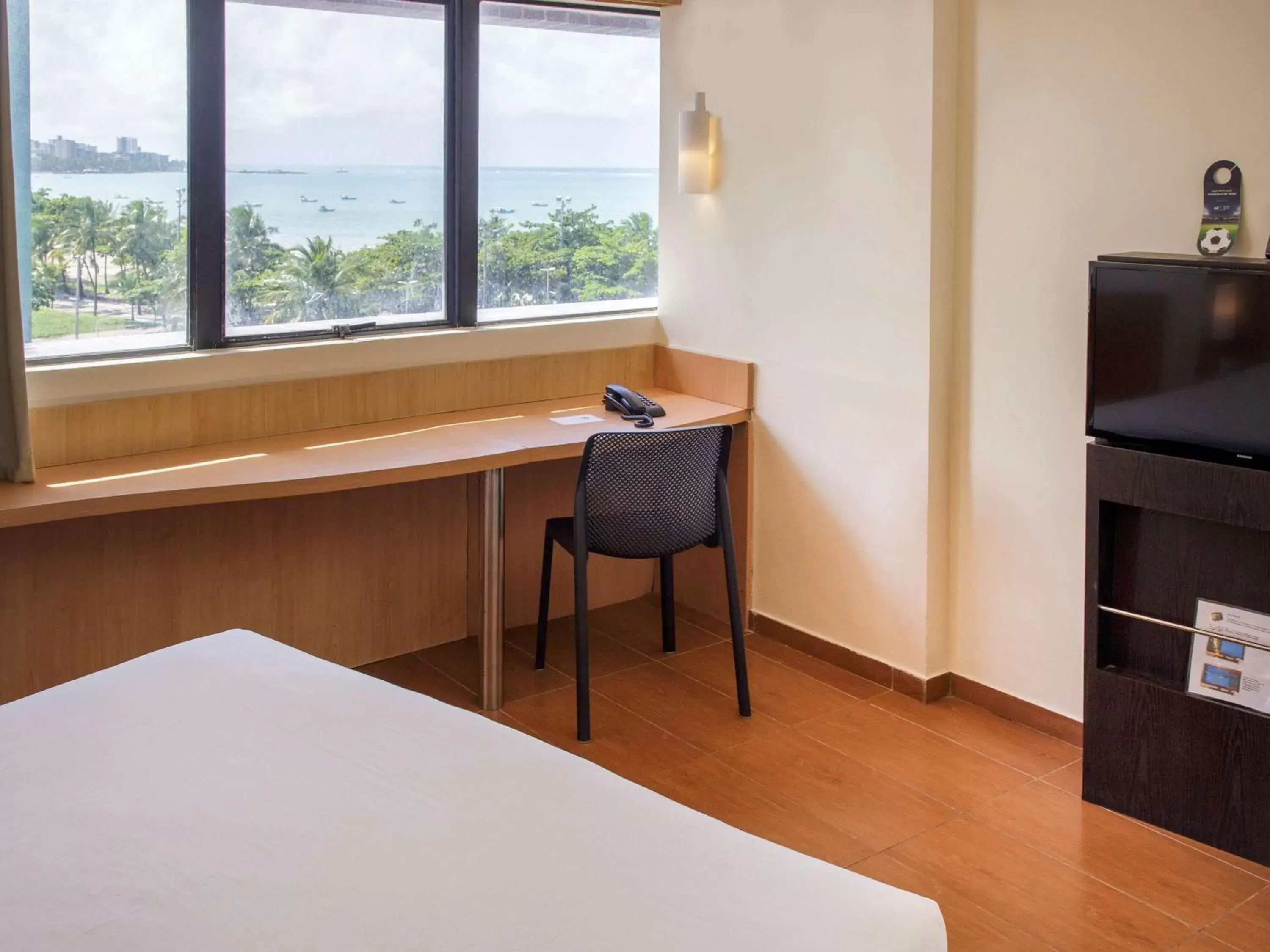 Photo of the whole room, TV/Entertainment Center in ibis Maceio Pajuçara