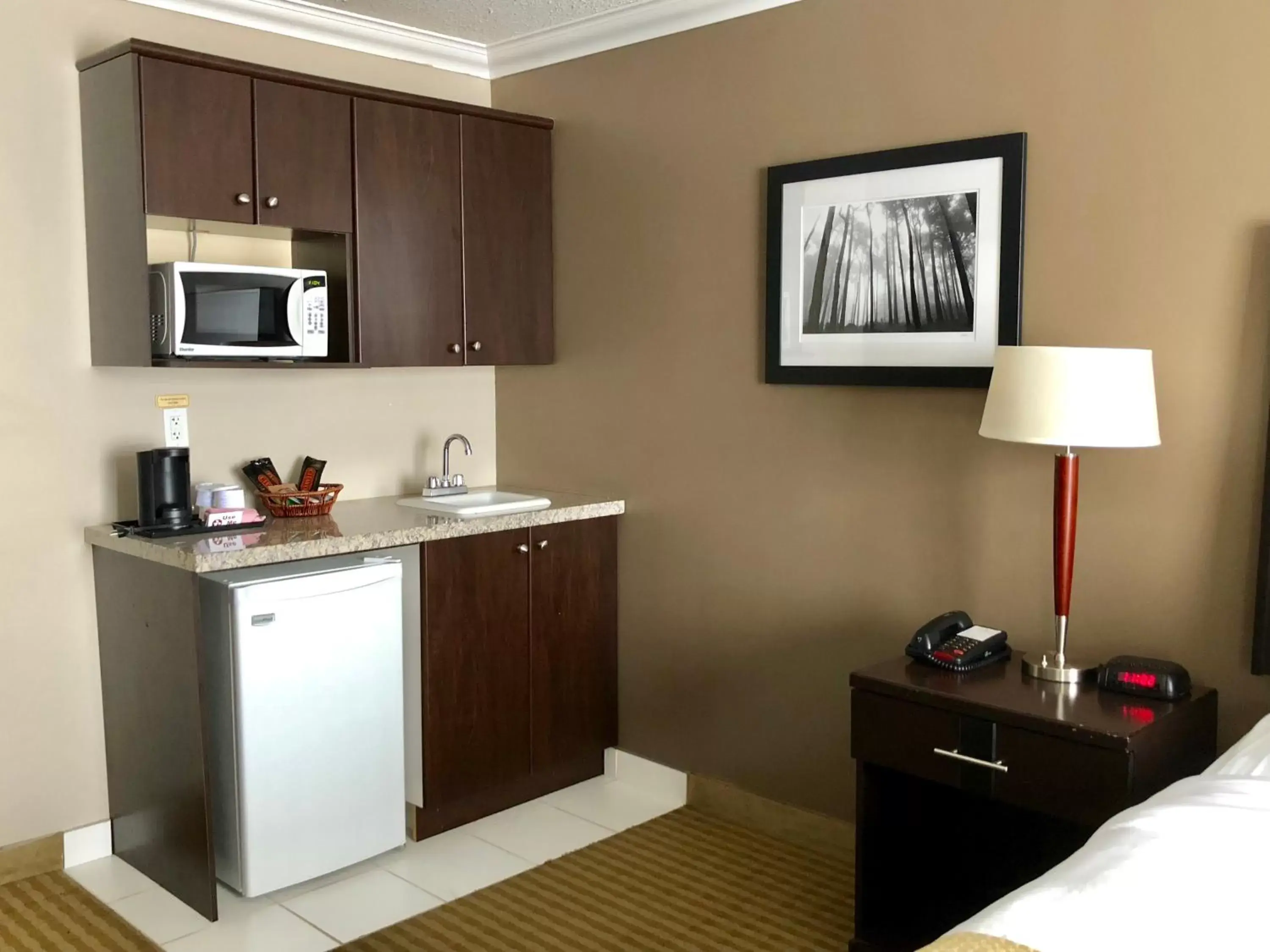 Kitchen/Kitchenette in Ramada by Wyndham Cold Lake