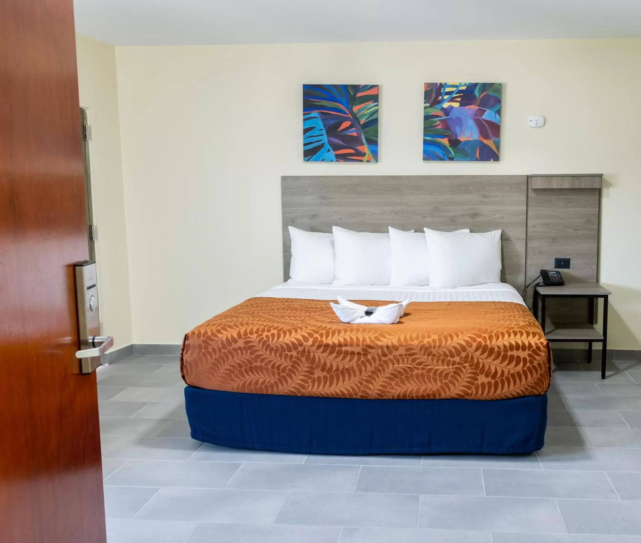 Bedroom, Bed in Mayaguez Plaza Hotel; SureStay Collection by Best Western