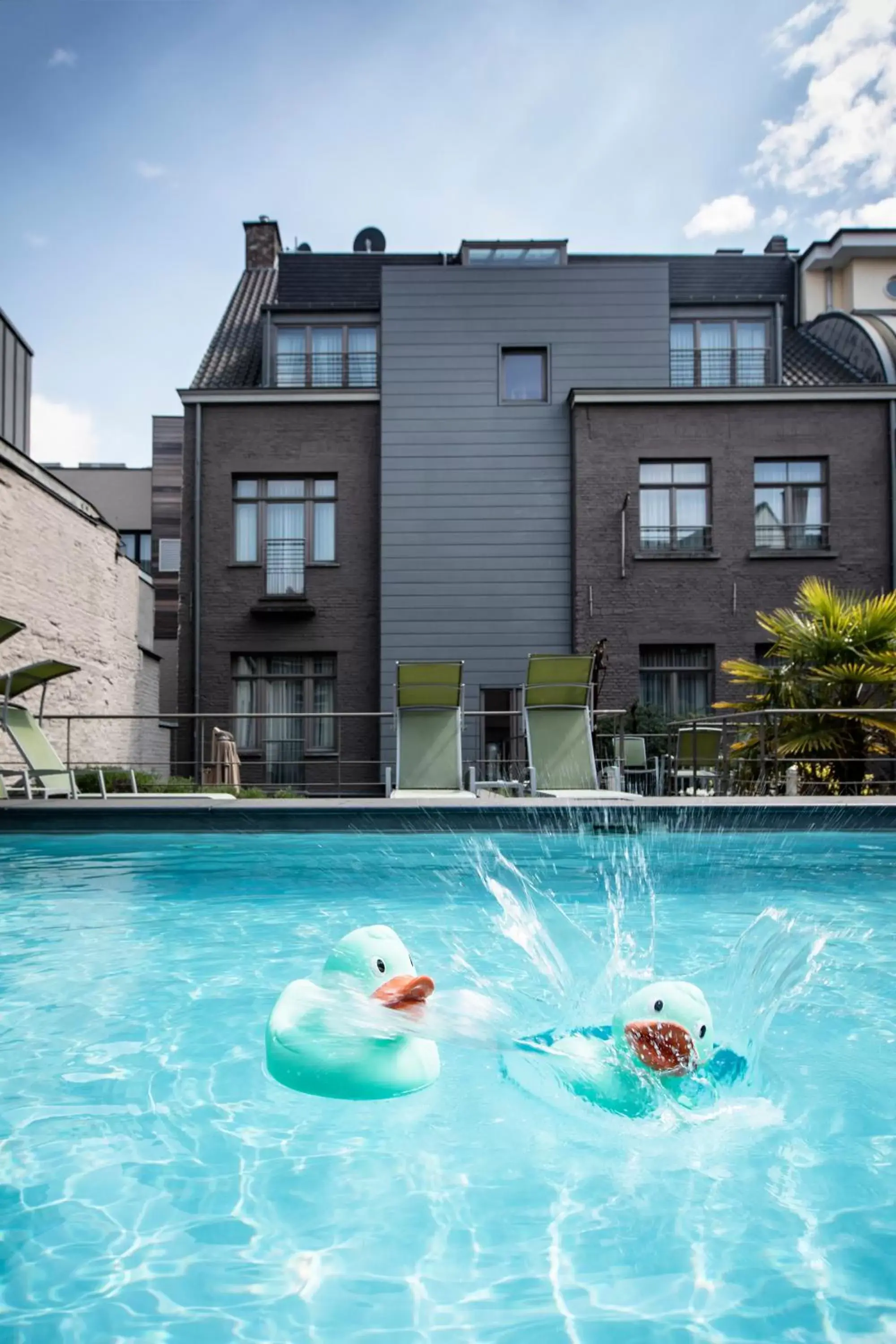 Property building, Swimming Pool in Hotel Harmony