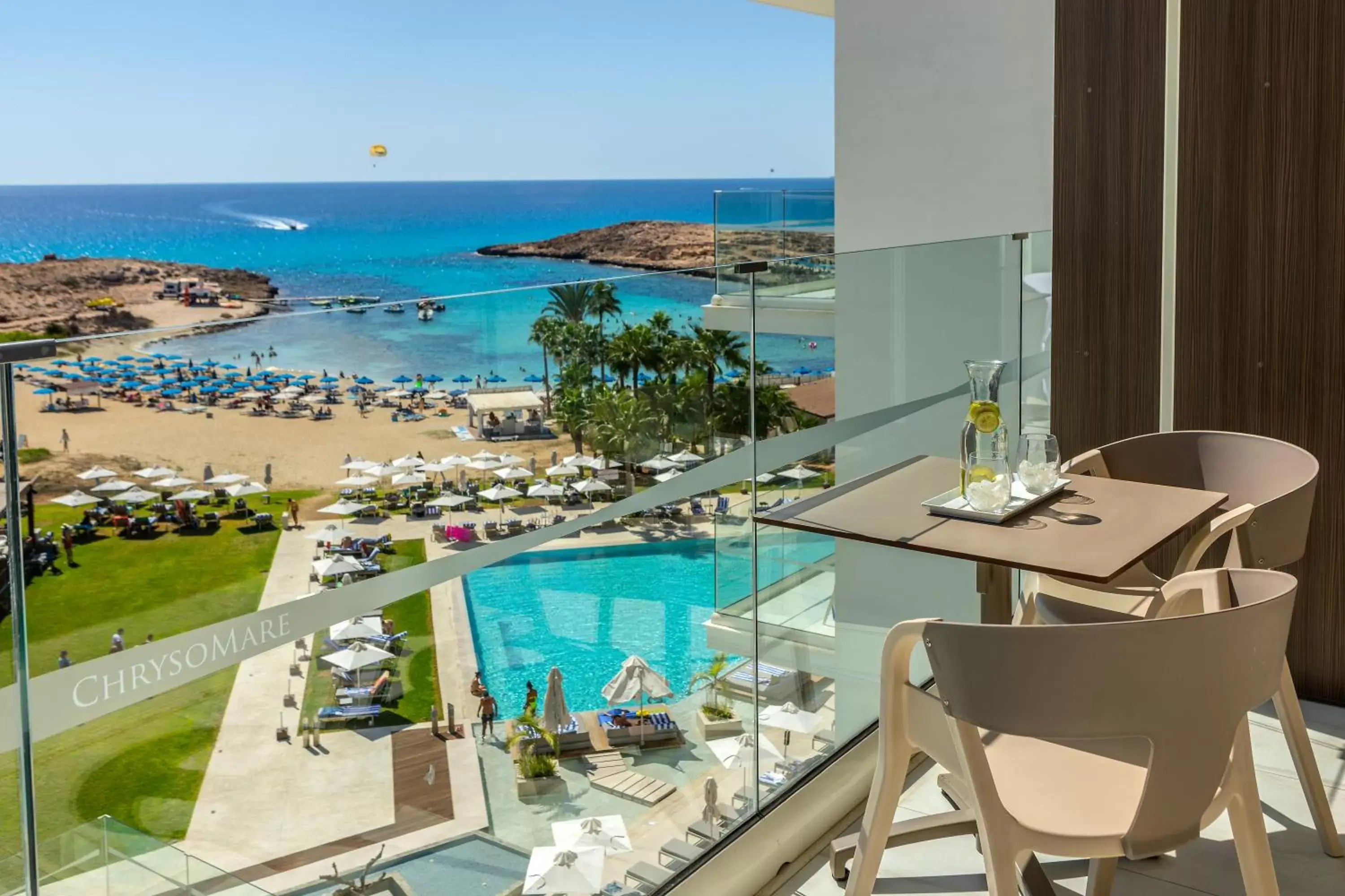 Balcony/Terrace, Pool View in Chrysomare Beach Hotel & Resort