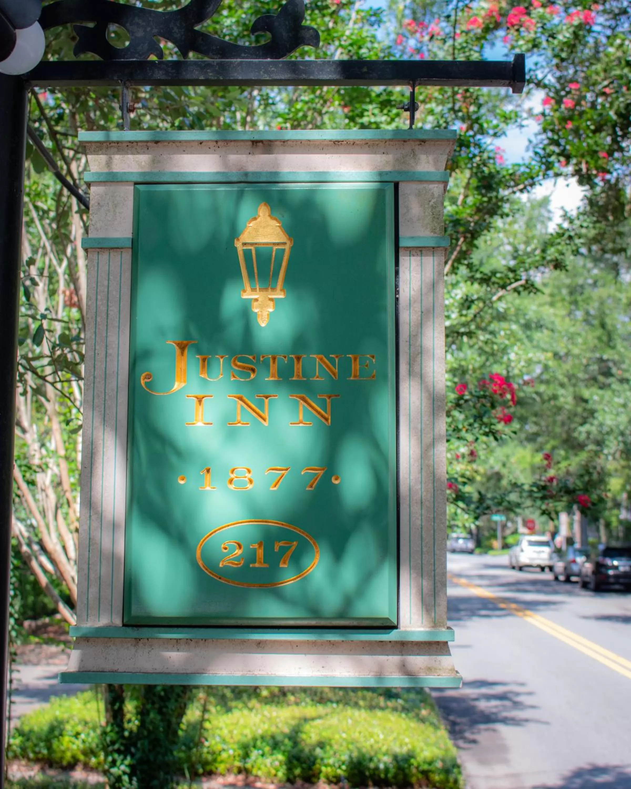 Property logo or sign in Justine Inn Savannah