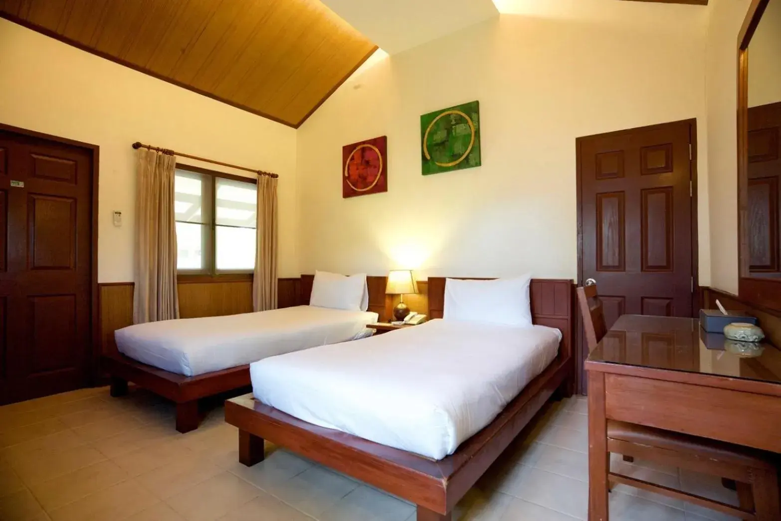 Bed in Pinnacle Samui Resort SHA Plus