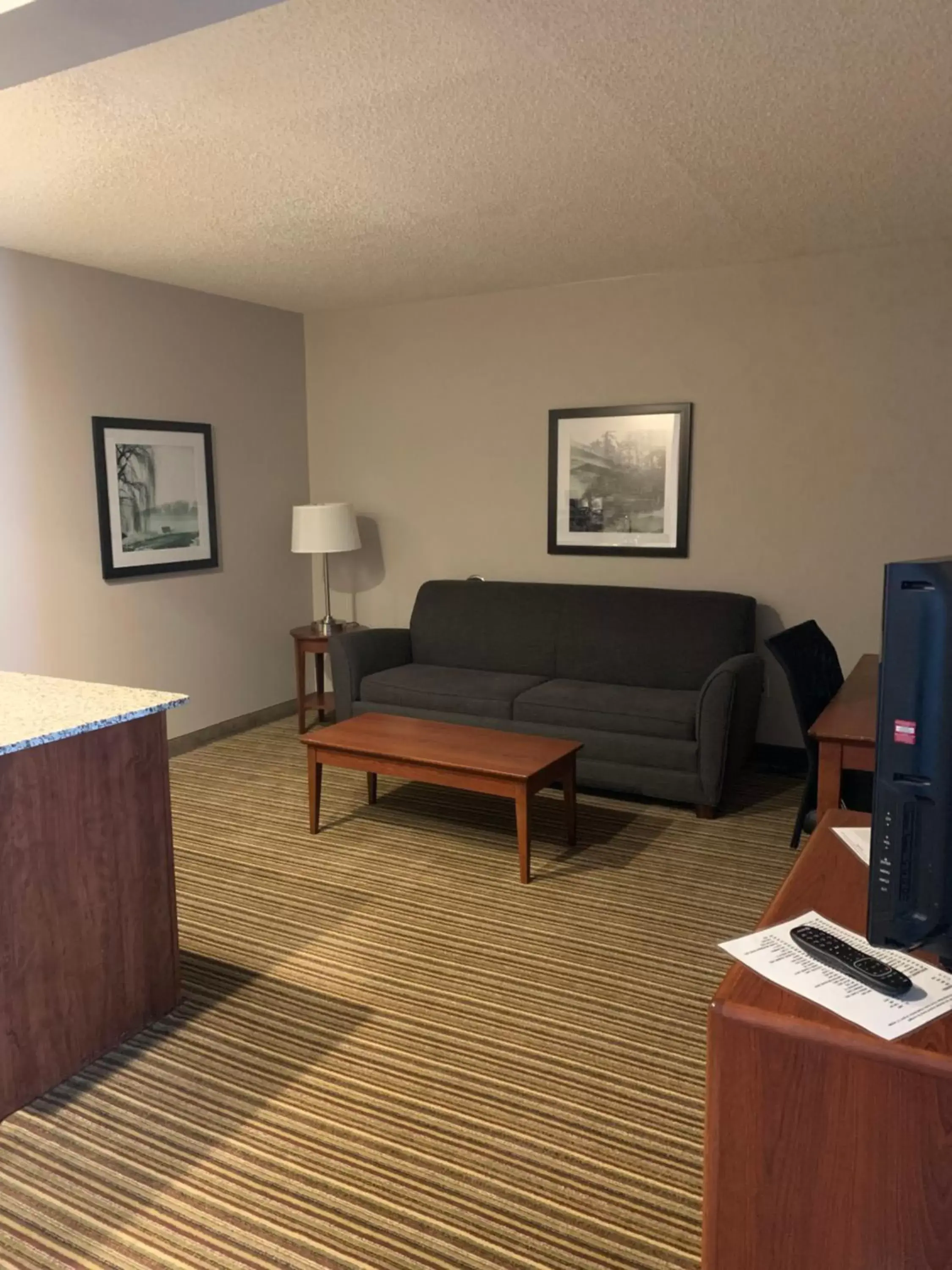 Living room, Seating Area in Best Western Park Oasis Inn