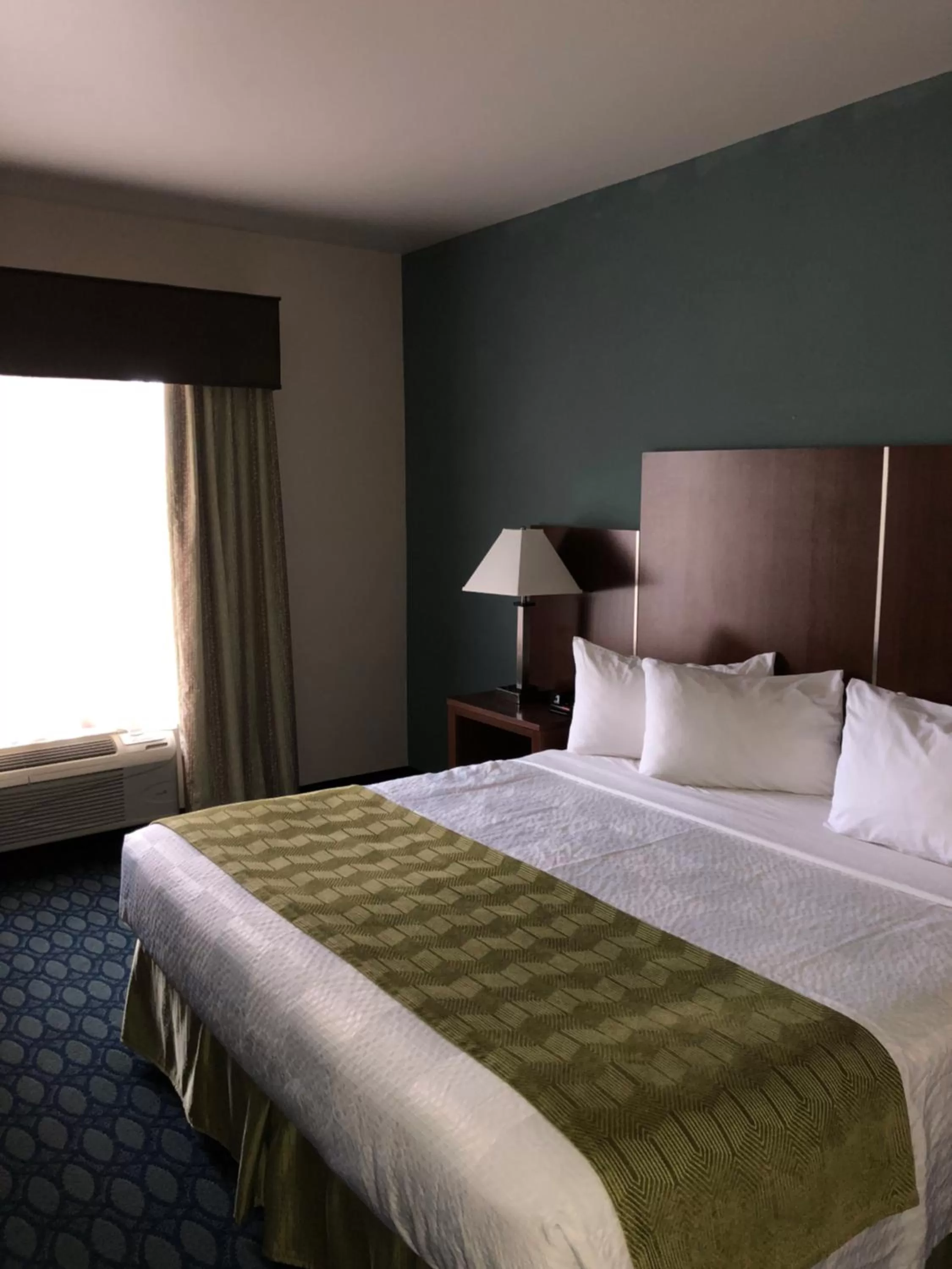 Bed in Countryview Inn & Suites