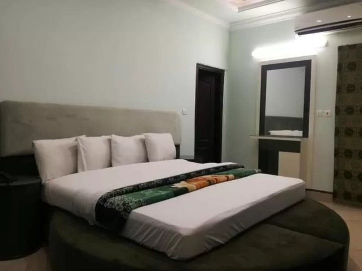 Bed in Hotel Grace inn