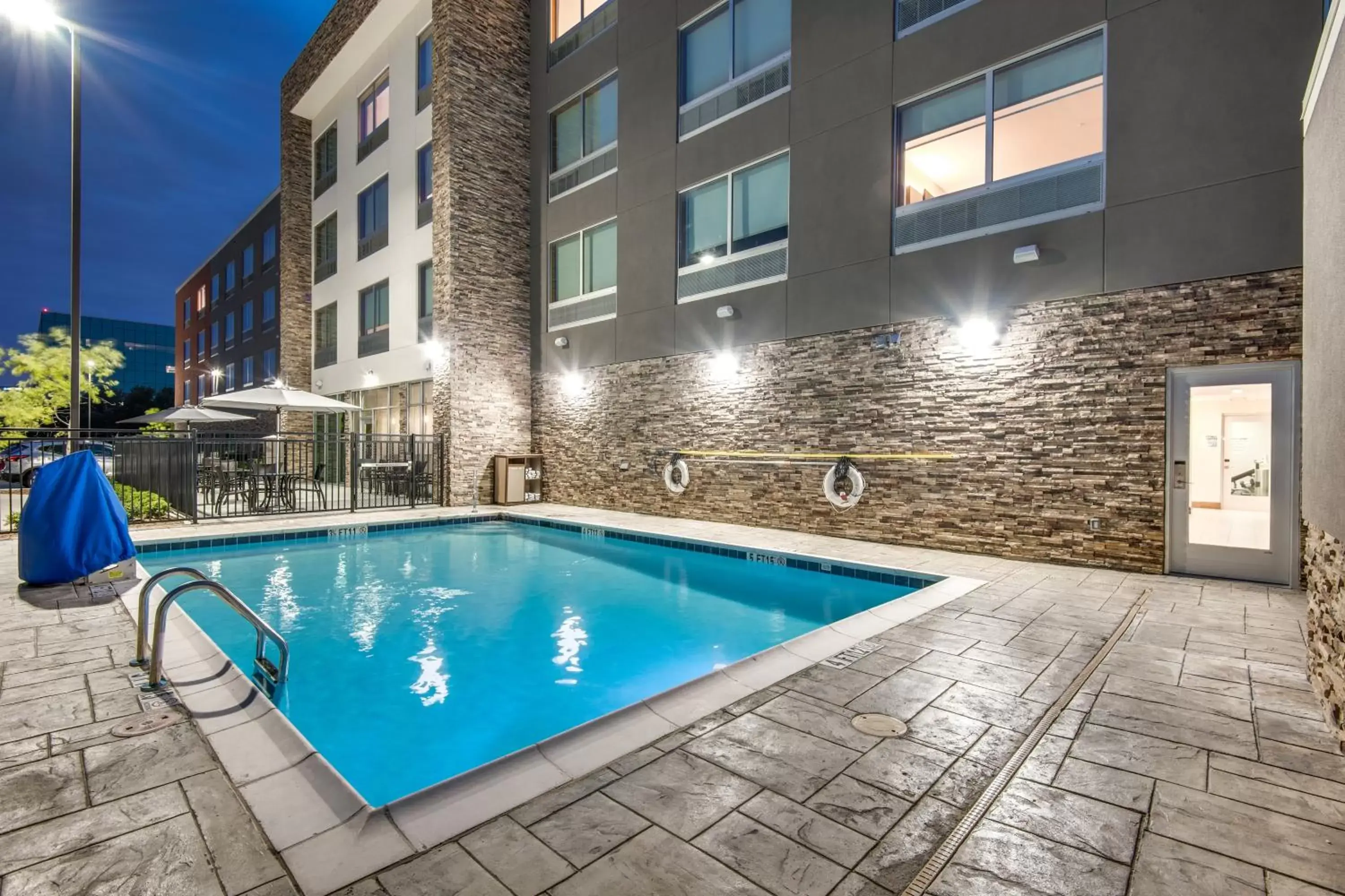 Swimming Pool in Holiday Inn Express & Suites Dallas North - Addison, an IHG Hotel