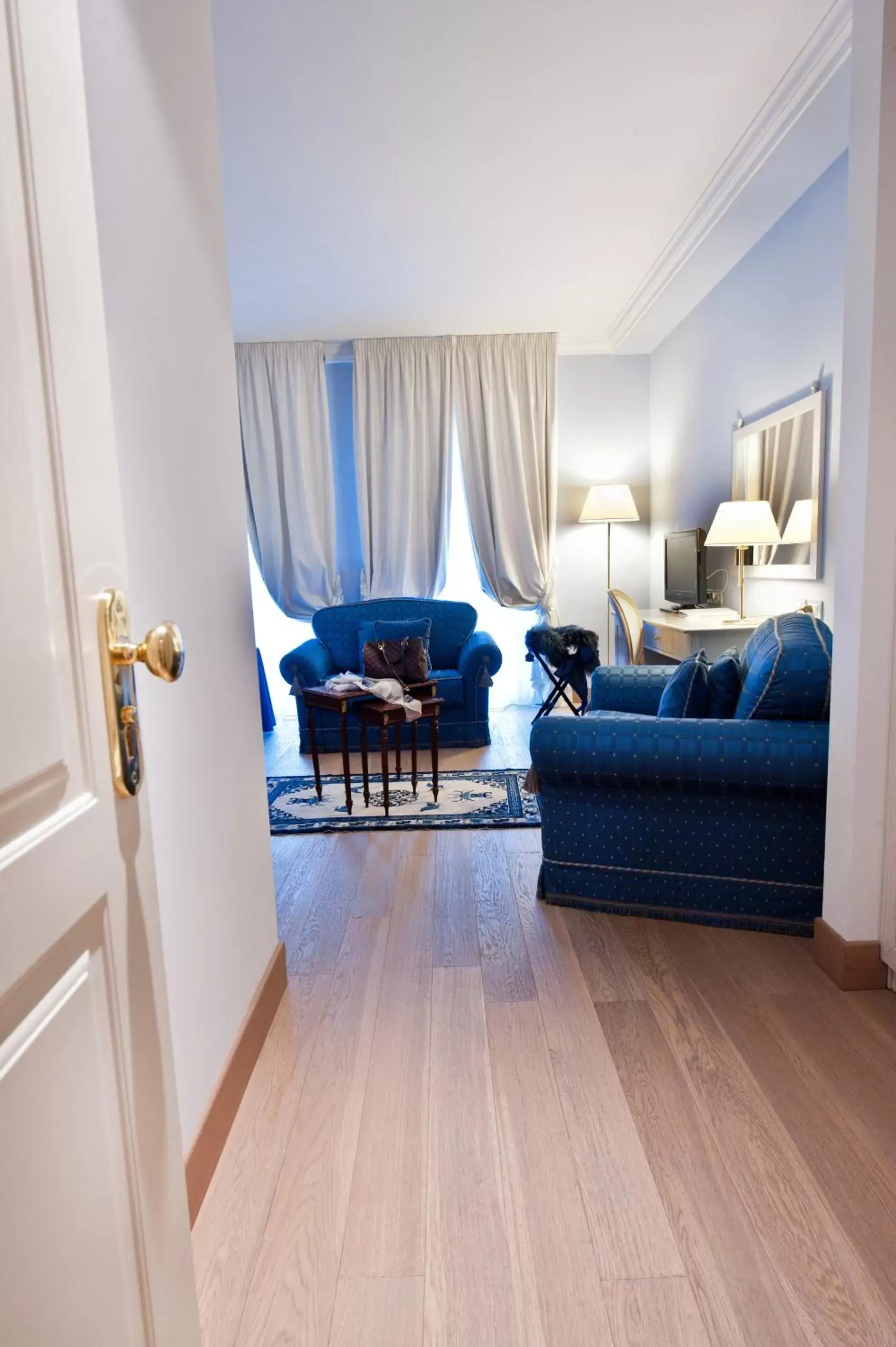 Living room in OSTUNI PALACE - Hotel Bistrot & SPA Living room in OSTUNI PALACE - Hotel Bistrot & SPA