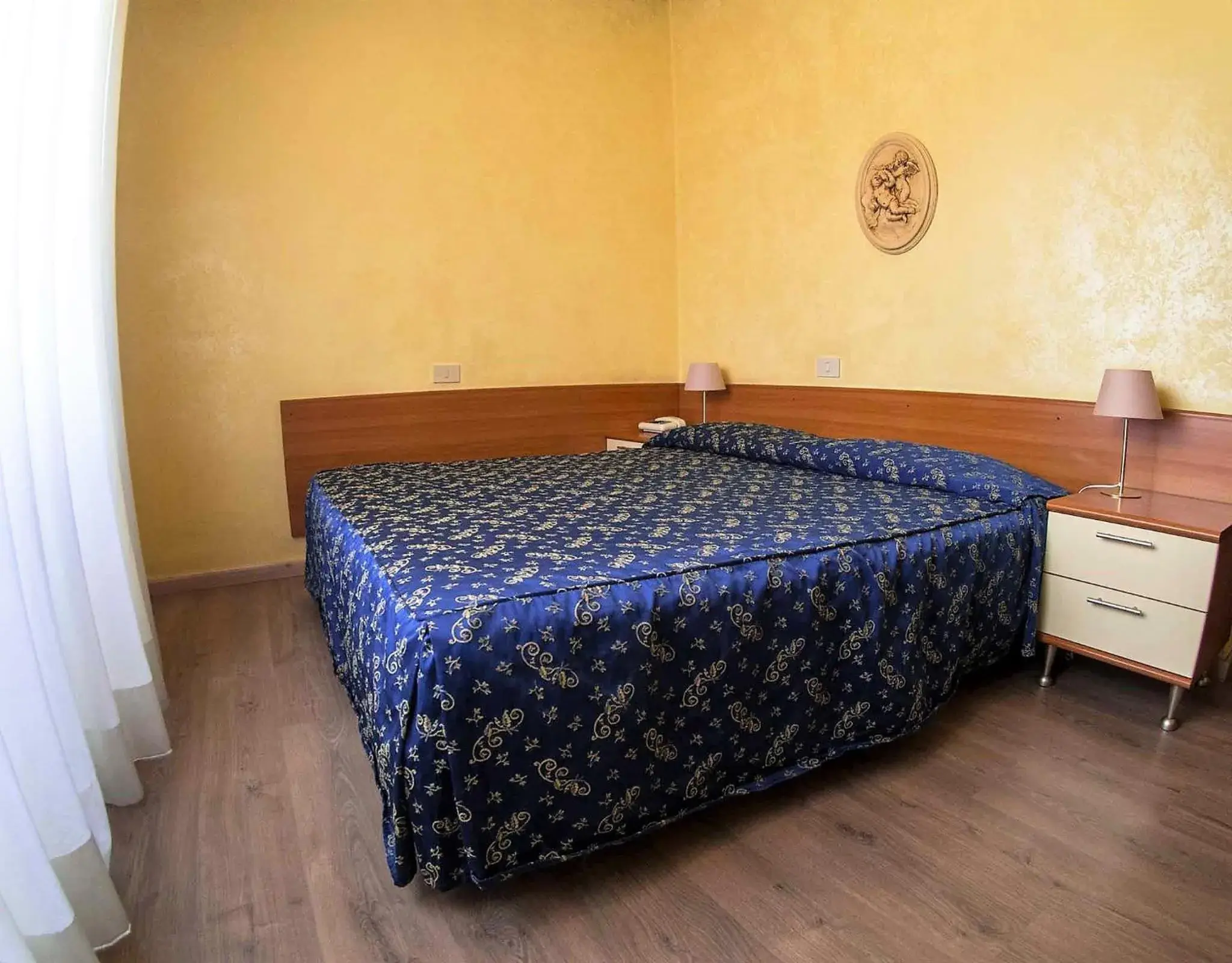 Bed in Albergo Dei Leoni