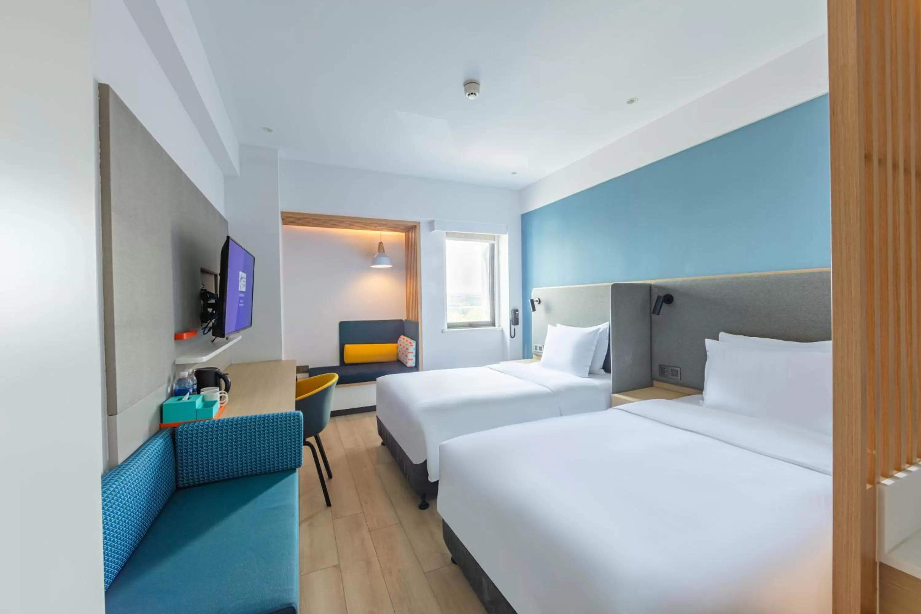Photo of the whole room, Bed in Holiday Inn Express Shanghai Pudong Airport by IHG