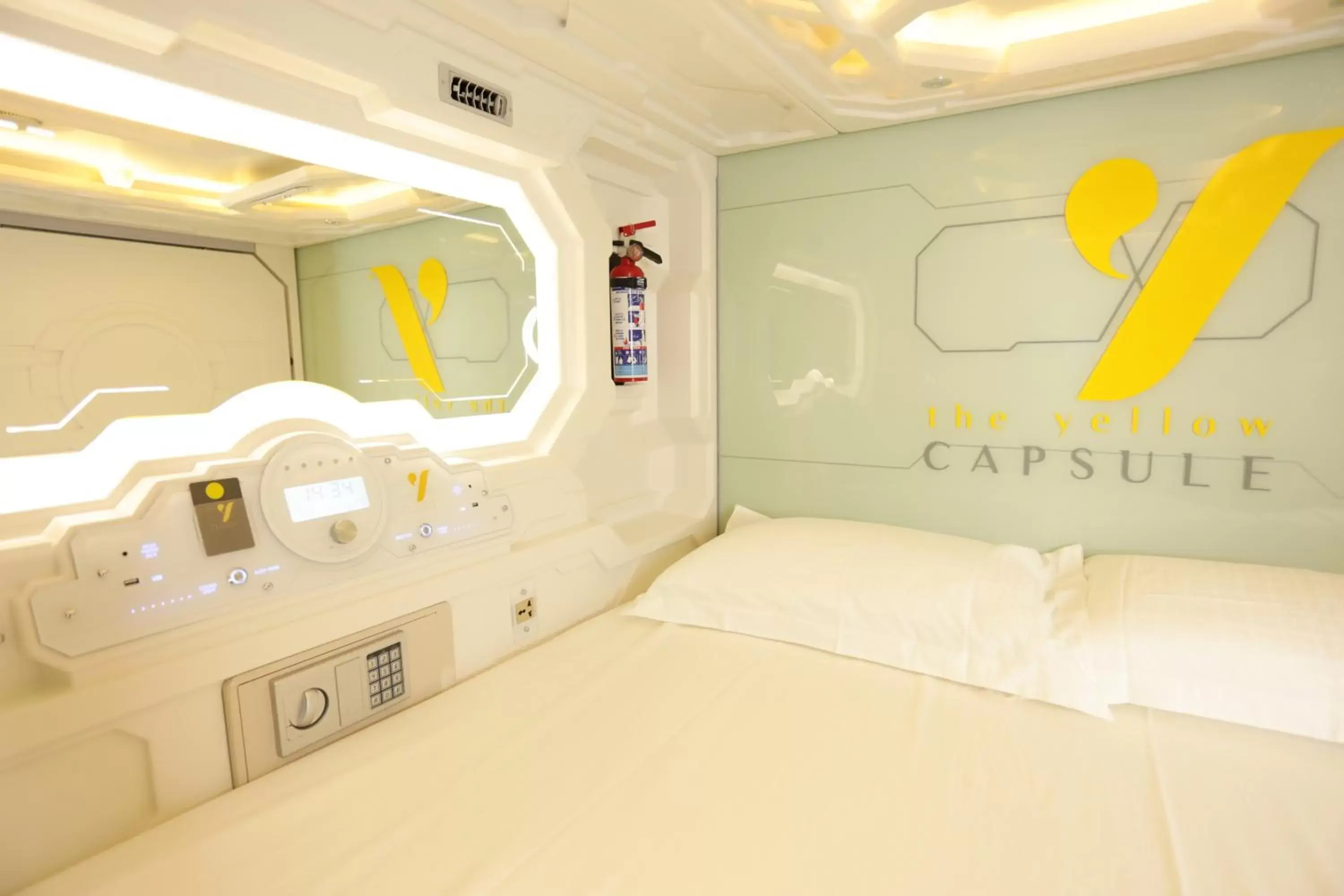 Bed in The Yellow Capsule Experience