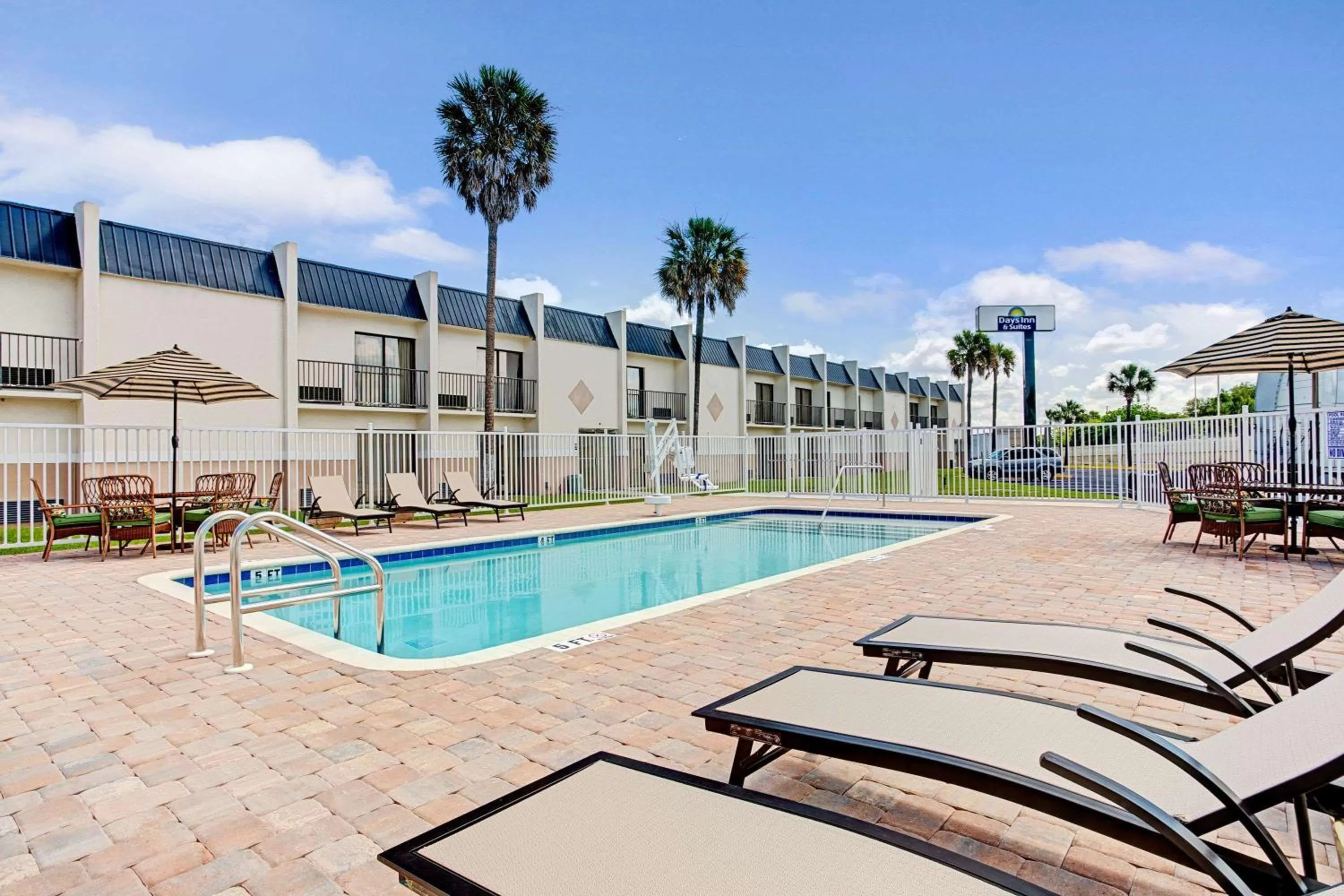 Swimming pool in Days Inn & Suites by Wyndham Tampa - Ybor City