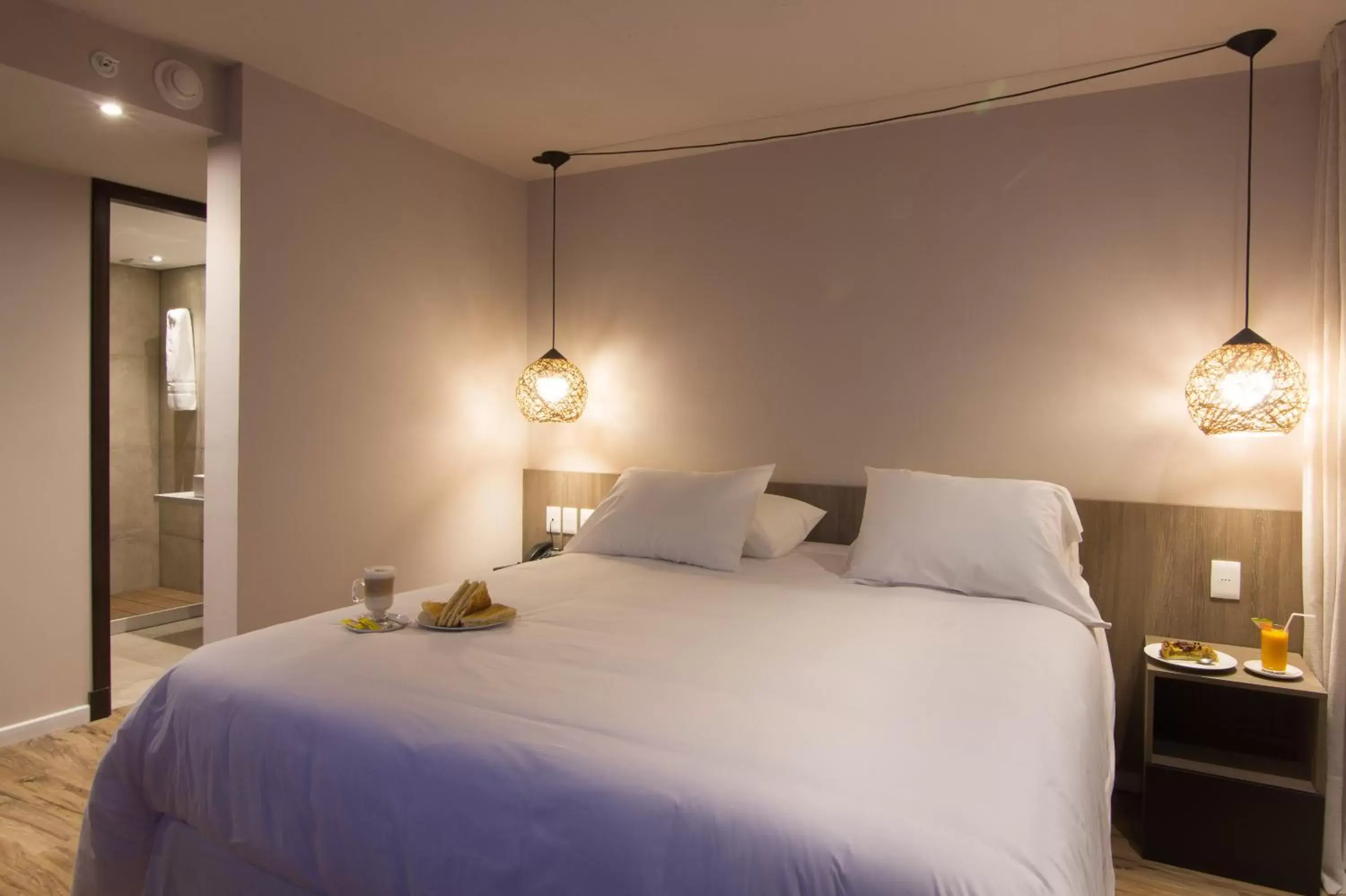 Bed in Hotel Ciudadano Suites