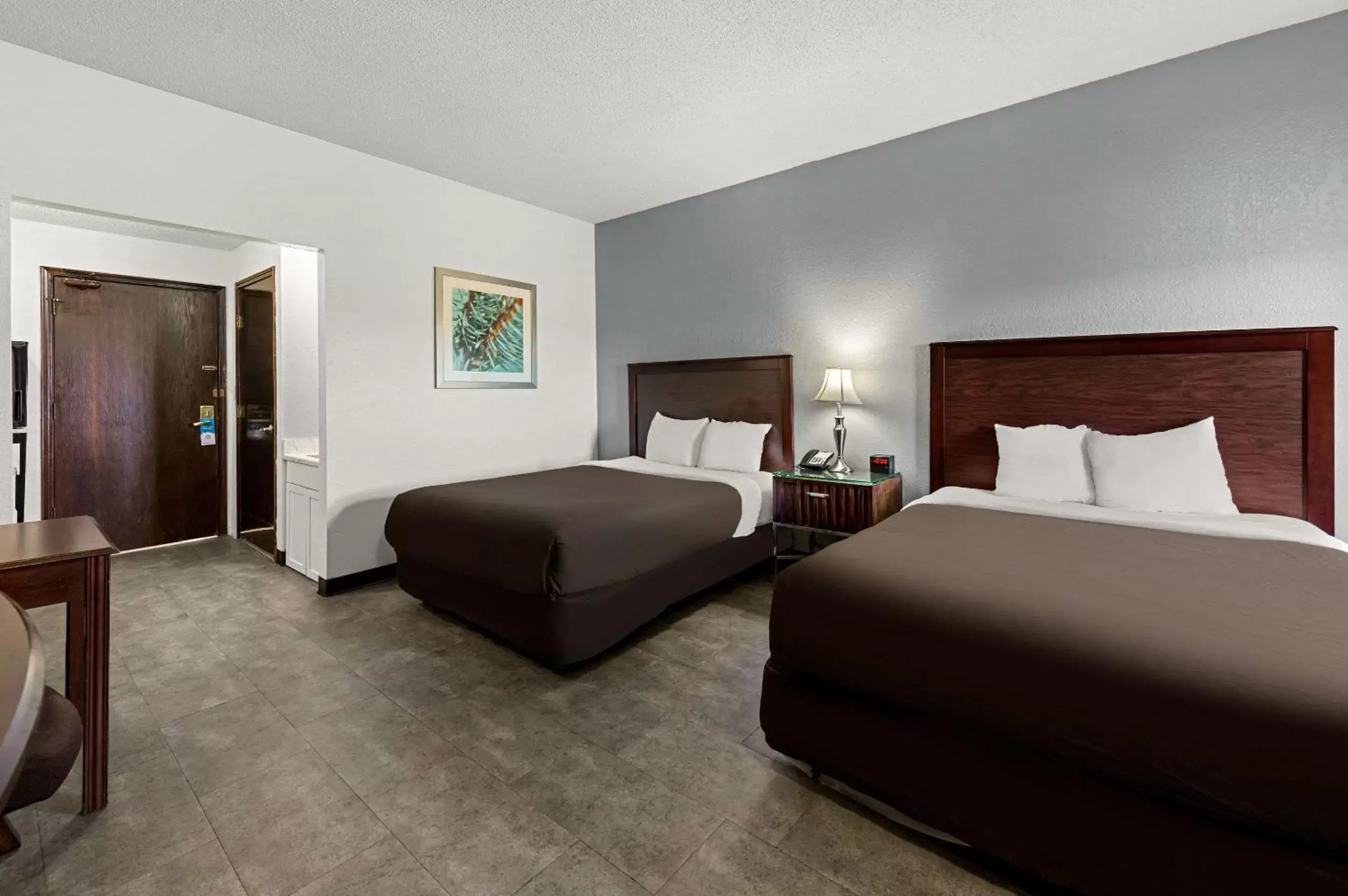 Bedroom, Bed in Suburban Studios Kansas City Airport North Bedroom, Bed in Suburban Studios Kansas City Airport North