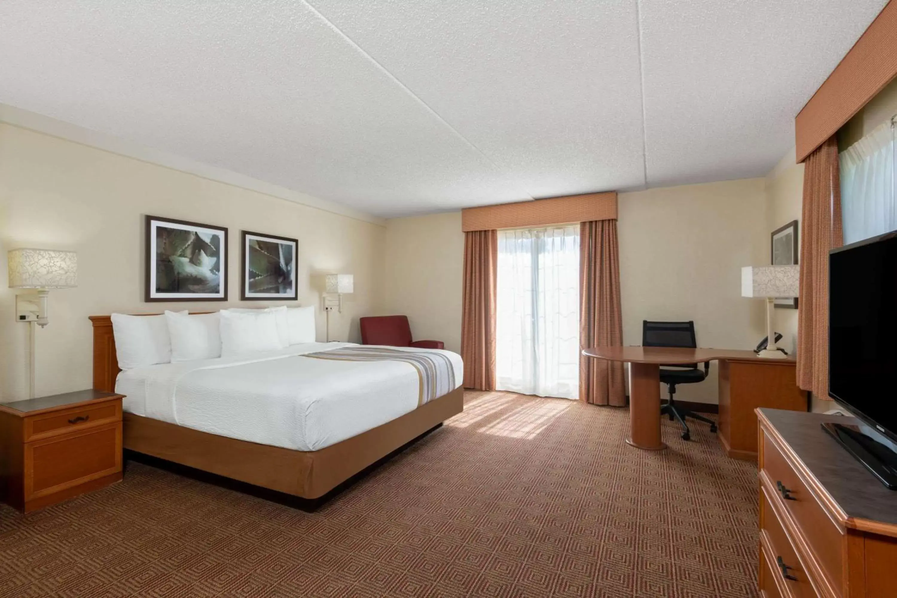 Photo of the whole room in La Quinta Inn by Wyndham Deerfield Beach I-95 at Hillsboro E