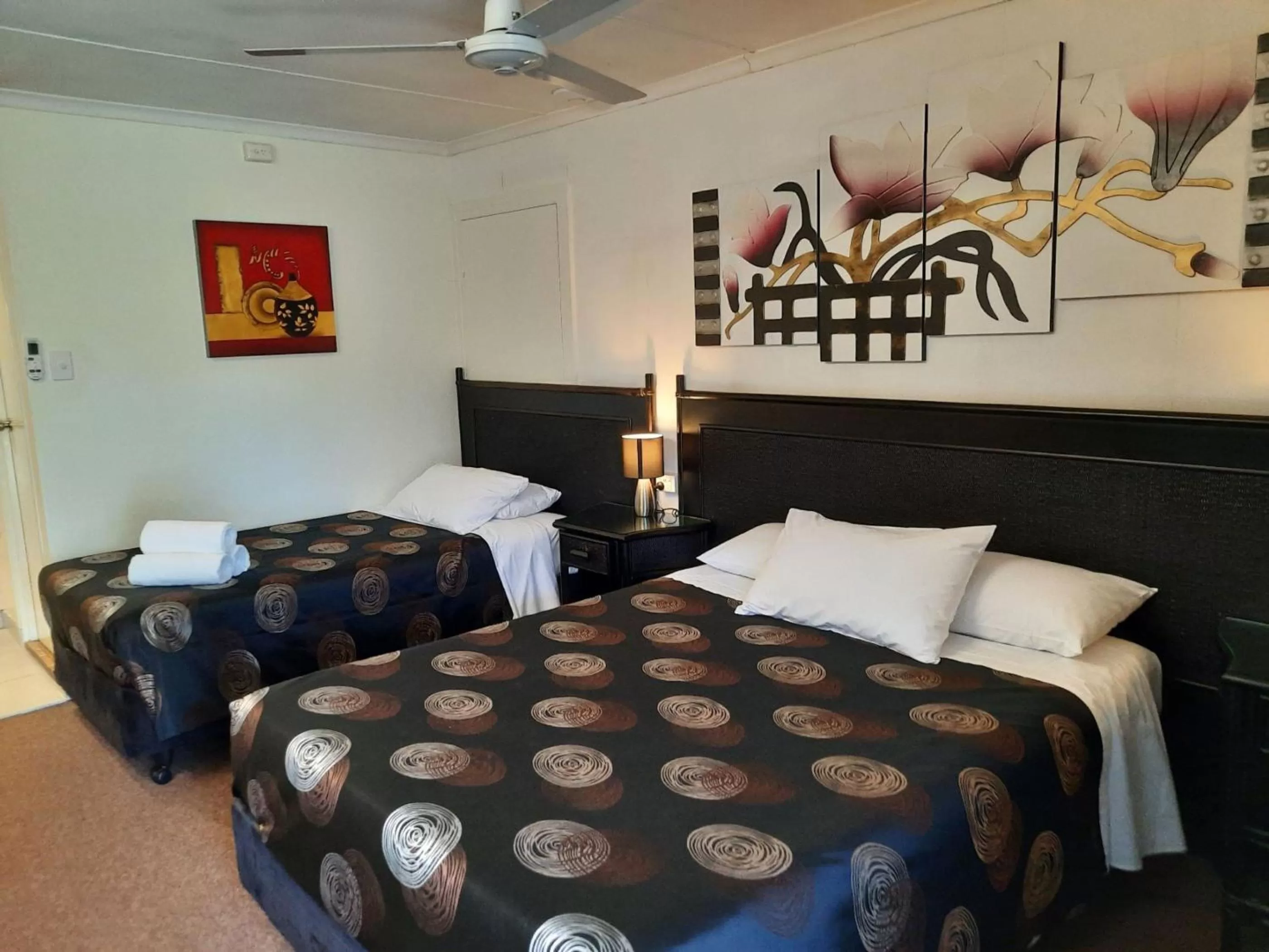 Bed in Flying Spur Motel