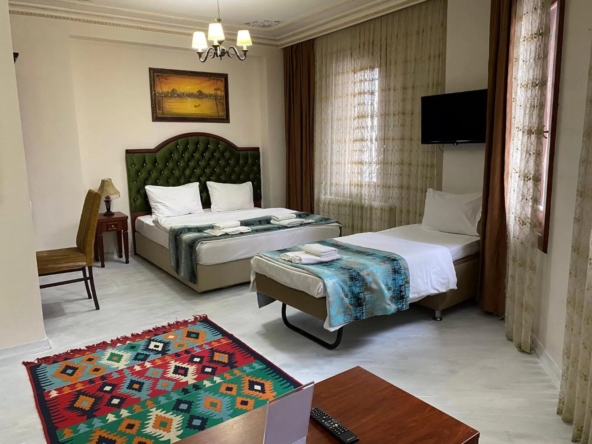 Photo of the whole room, Bed in Atam Suites