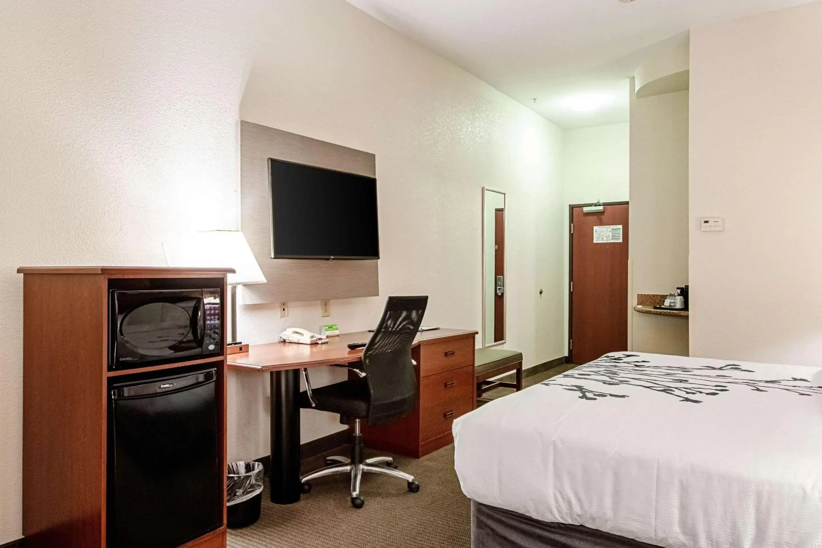 Photo of the whole room, TV/Entertainment Center in Sleep Inn & Suites