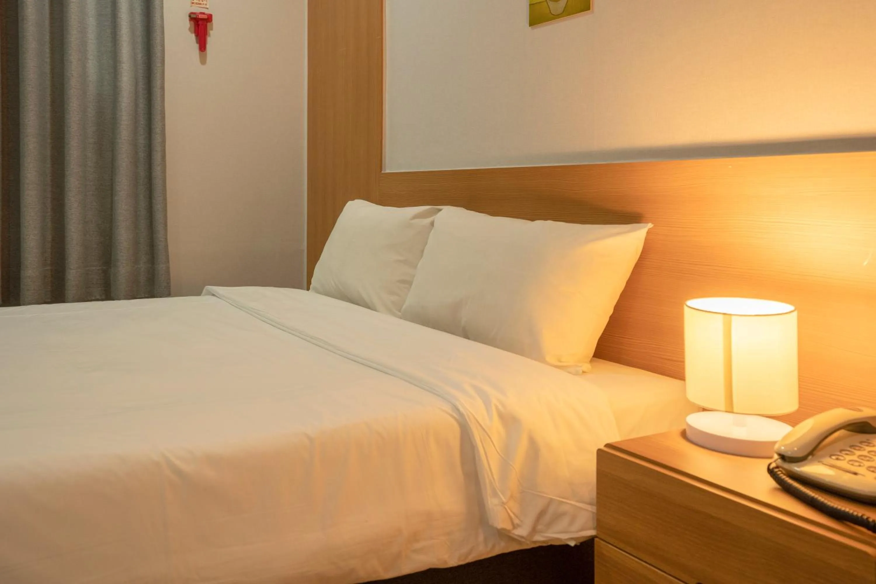 Bed in Jeju Stay Hotel