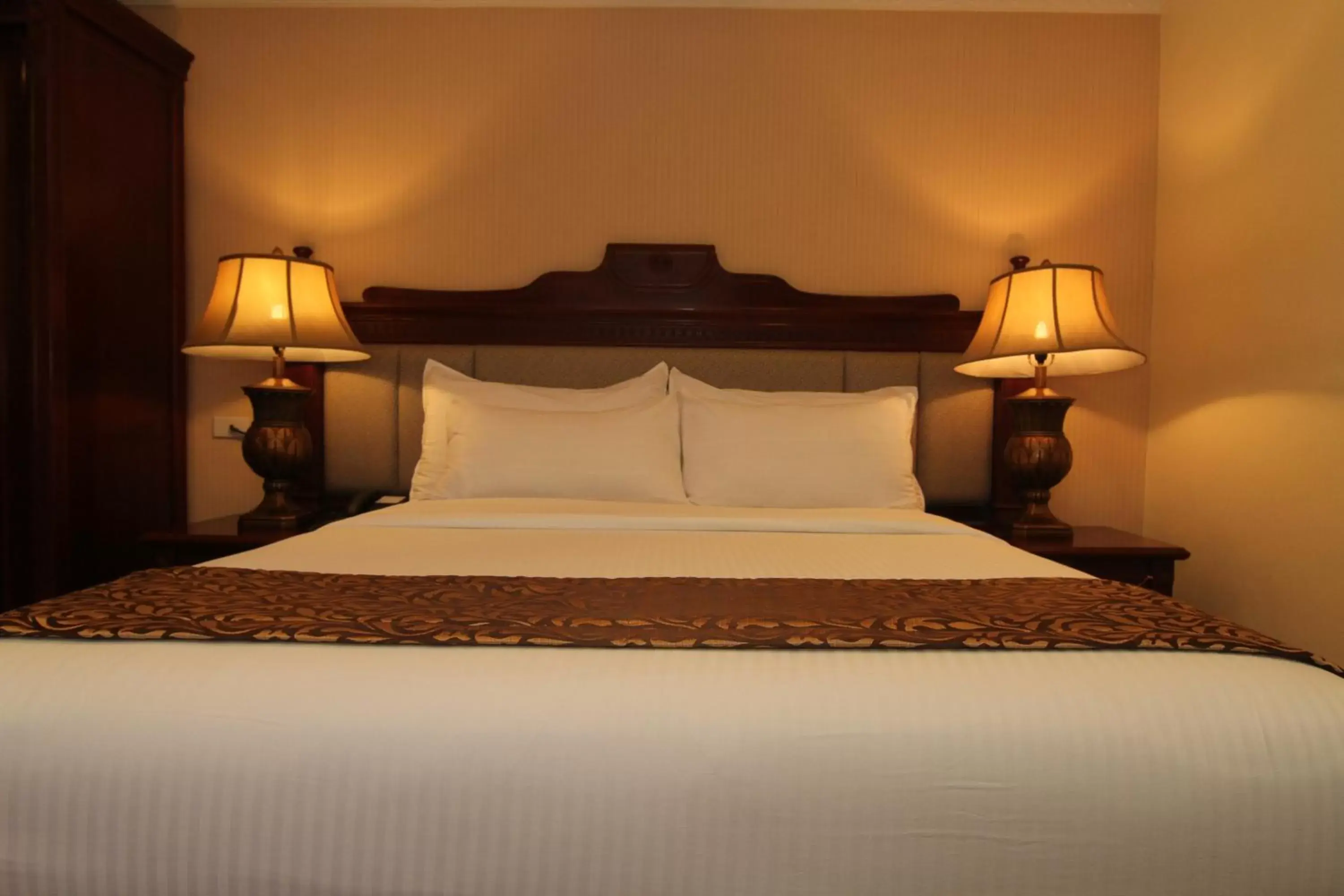 Bed in Villa Caceres Hotel