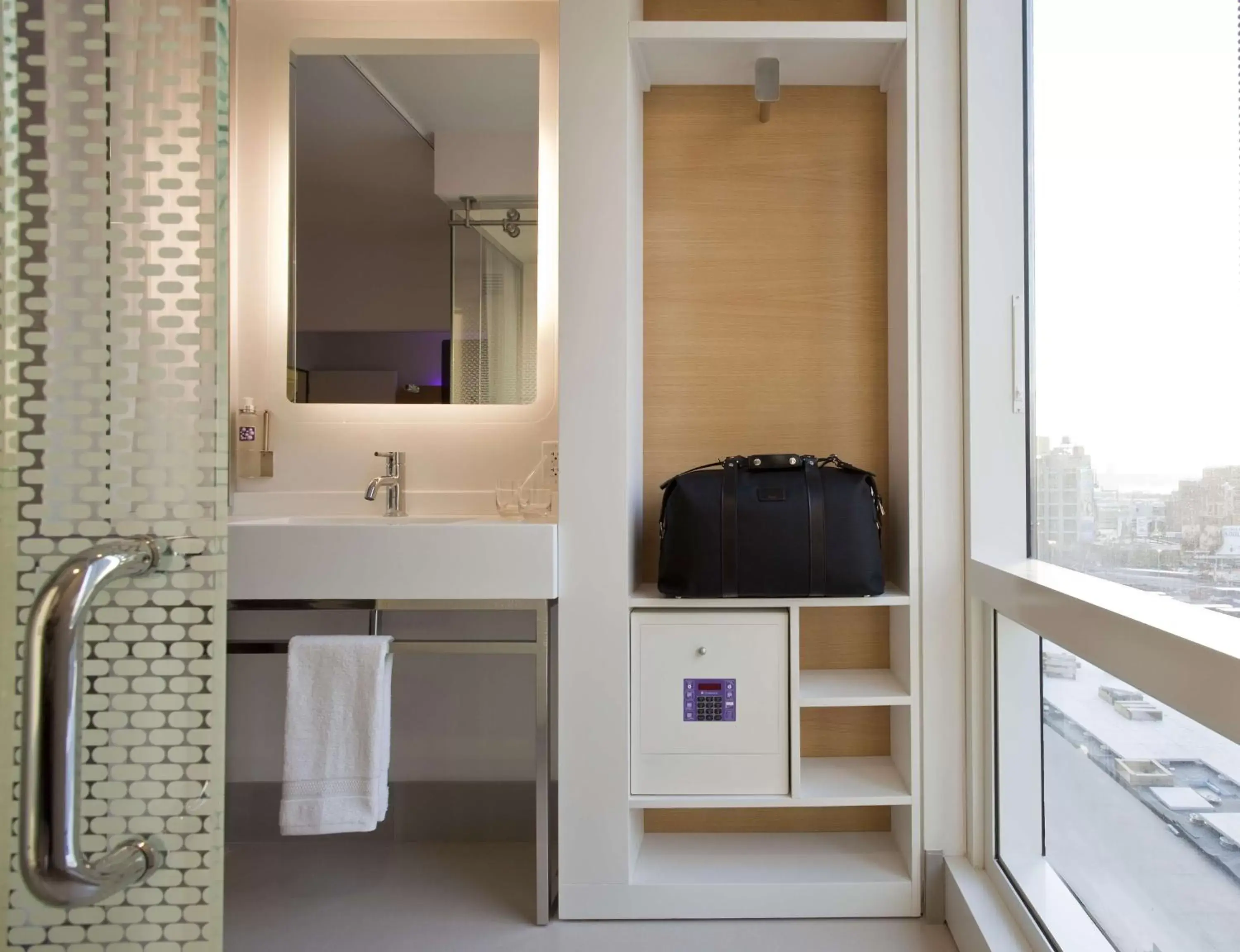 Photo of the whole room, Bathroom in YOTEL New York Times Square
