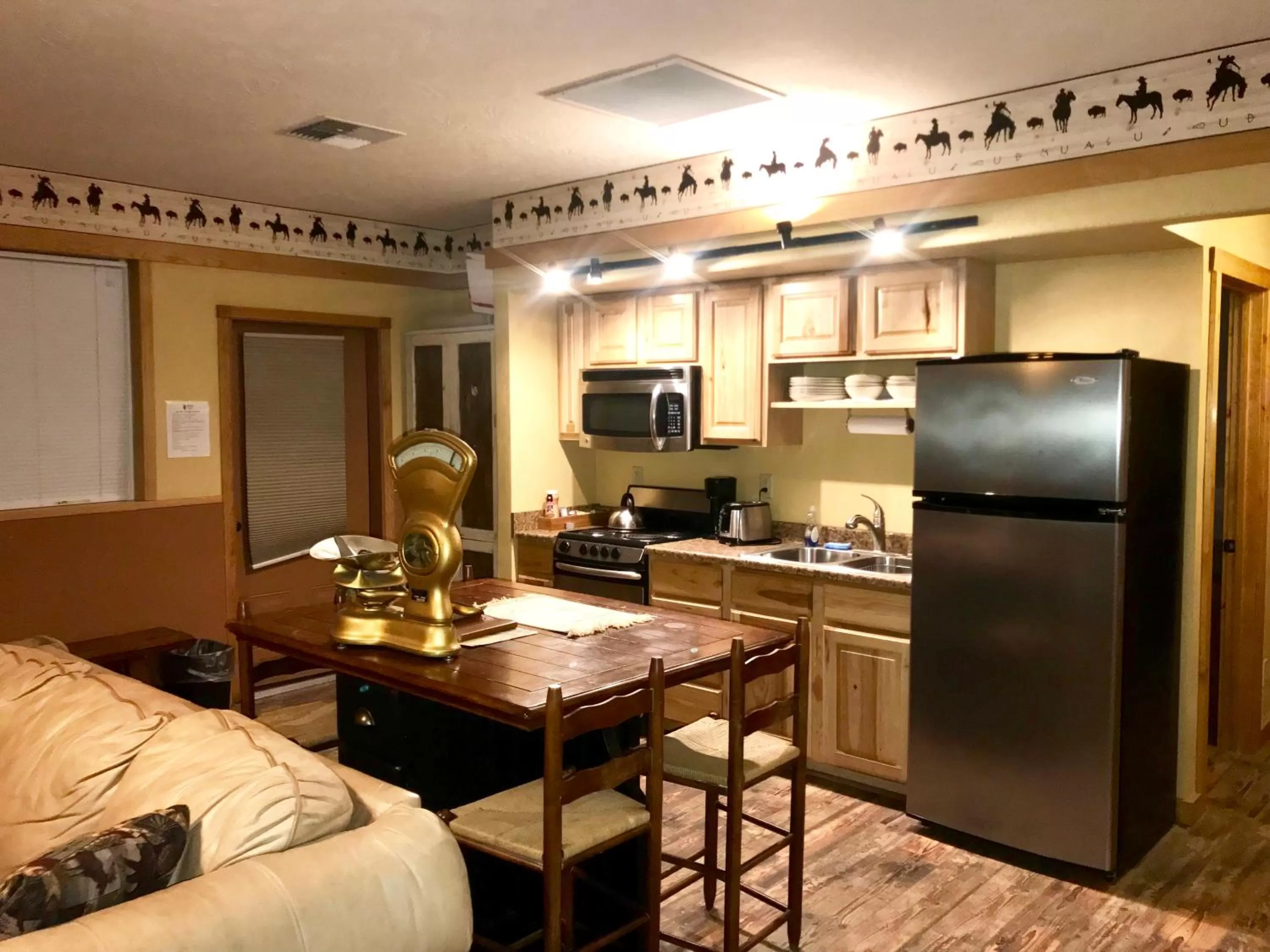 Kitchen or kitchenette in Cowboy's Lodge