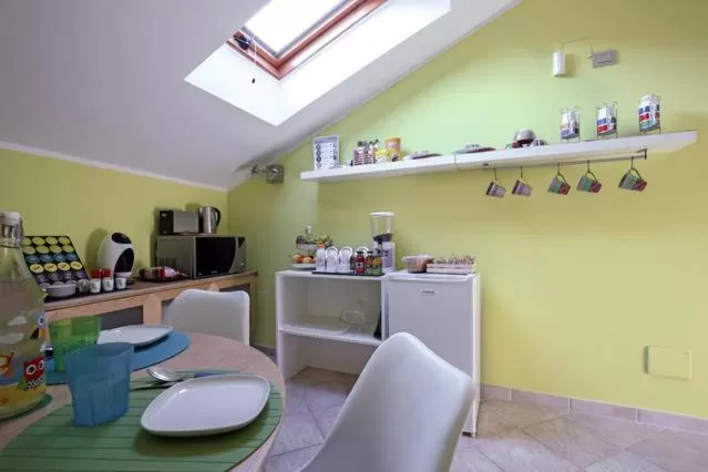 Communal lounge/ TV room in B&B Portanova