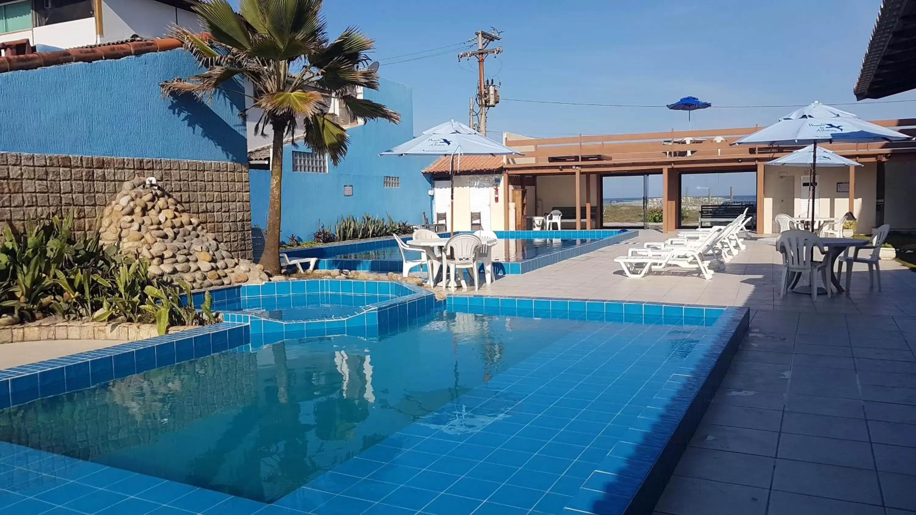 Balcony/Terrace, Swimming Pool in Pousada do Albatroz