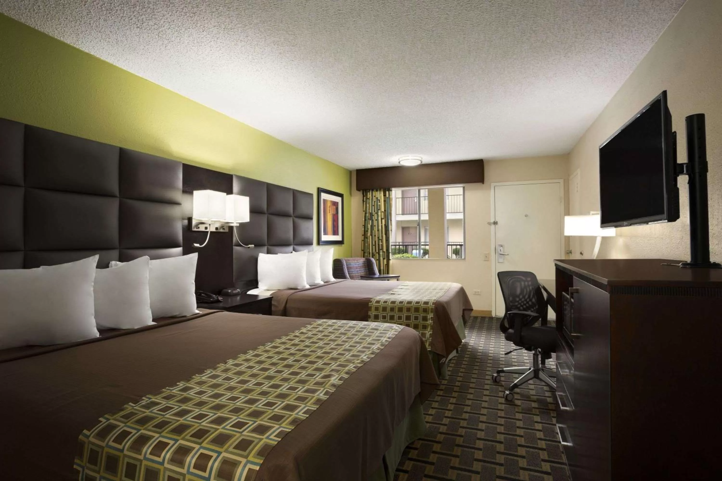 Photo of the whole room, Bed in Days Inn by Wyndham Dallas Irving