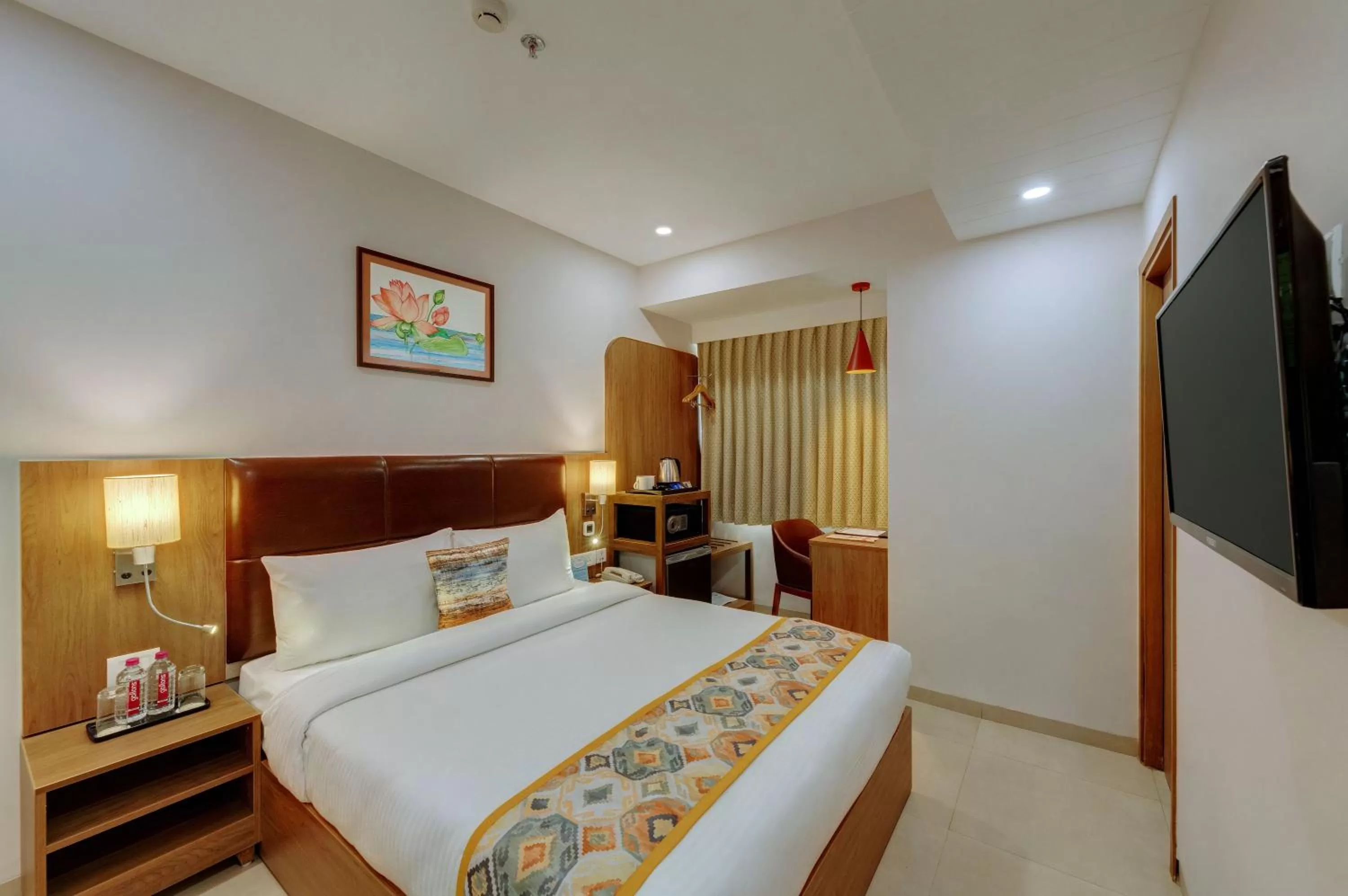 Photo of the whole room, Bed in The Beacon Hotel Vadodara