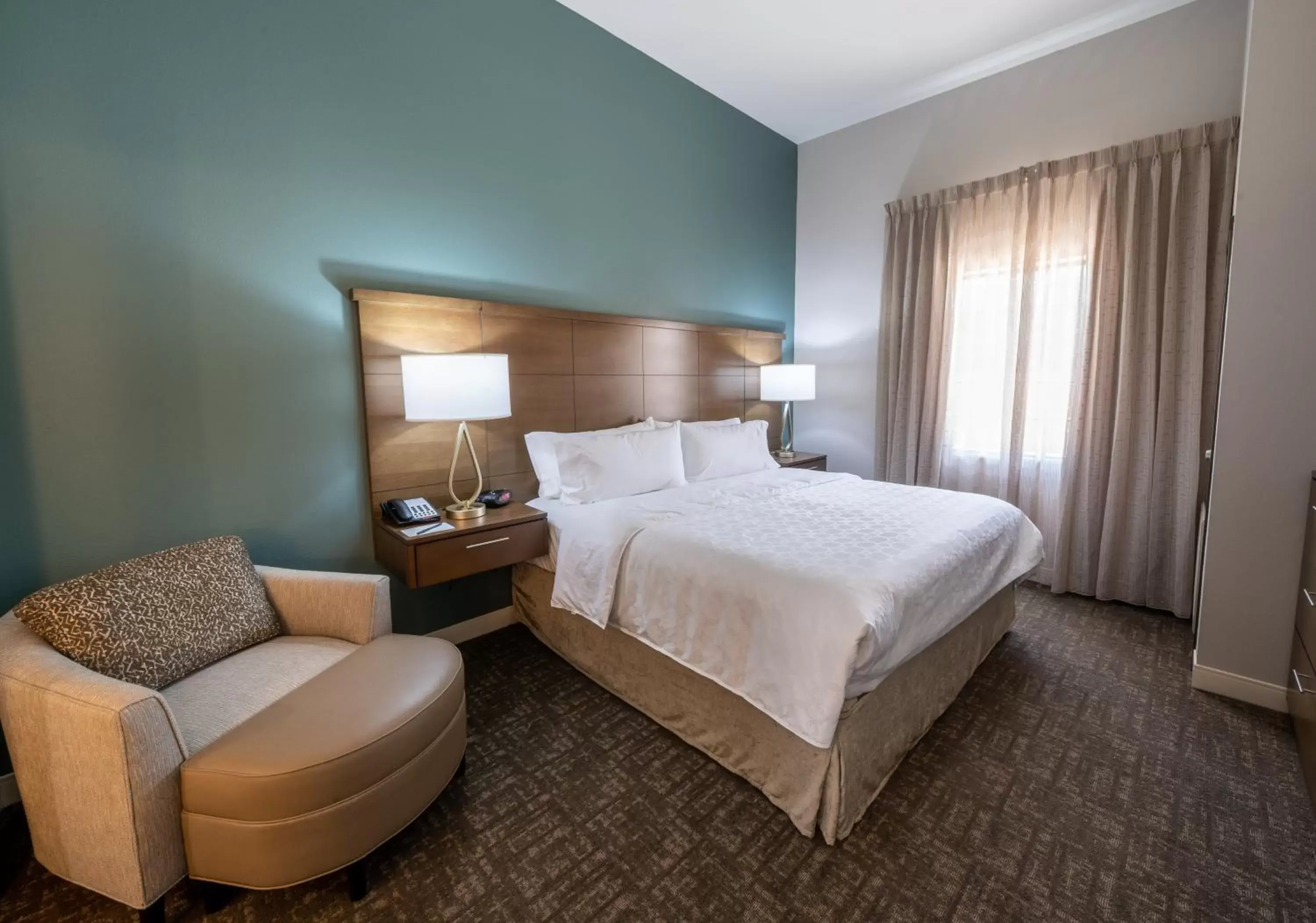 Photo of the whole room, Bed in Staybridge Suites Houston East - Baytown, an IHG Hotel