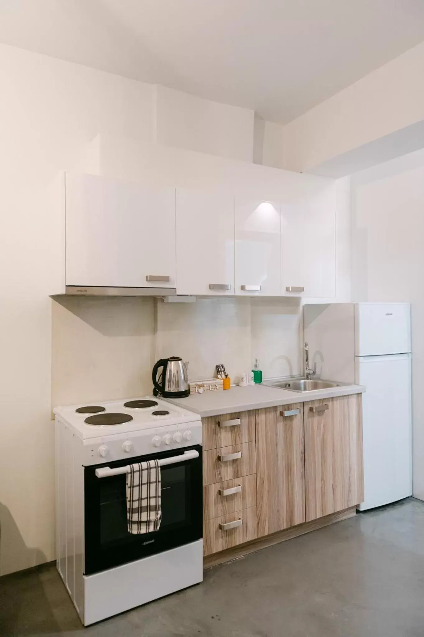 Kitchen/Kitchenette in MAGNOLIA SUITES