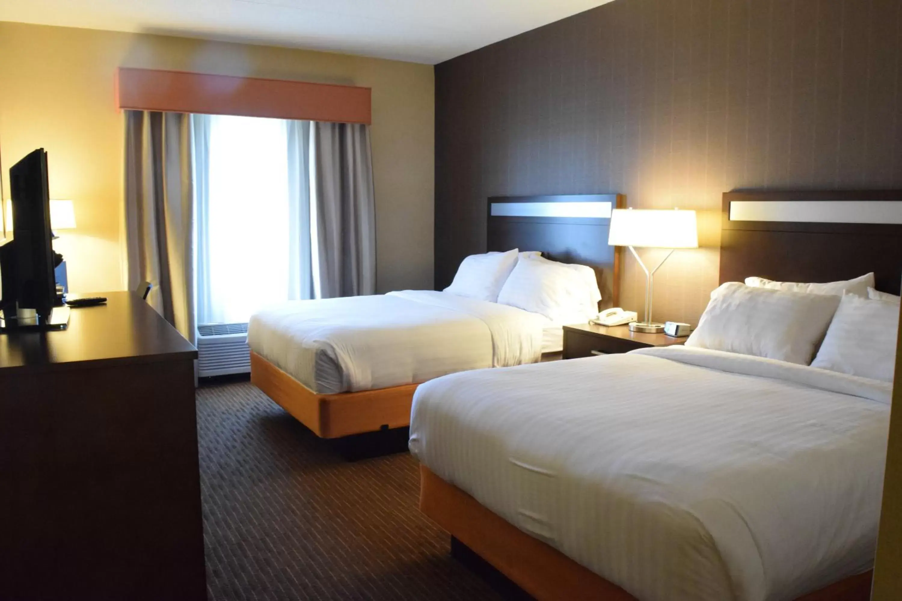 Bed in Holiday Inn Express Hotel & Suites Watertown - Thousand Islands, an IHG Hotel