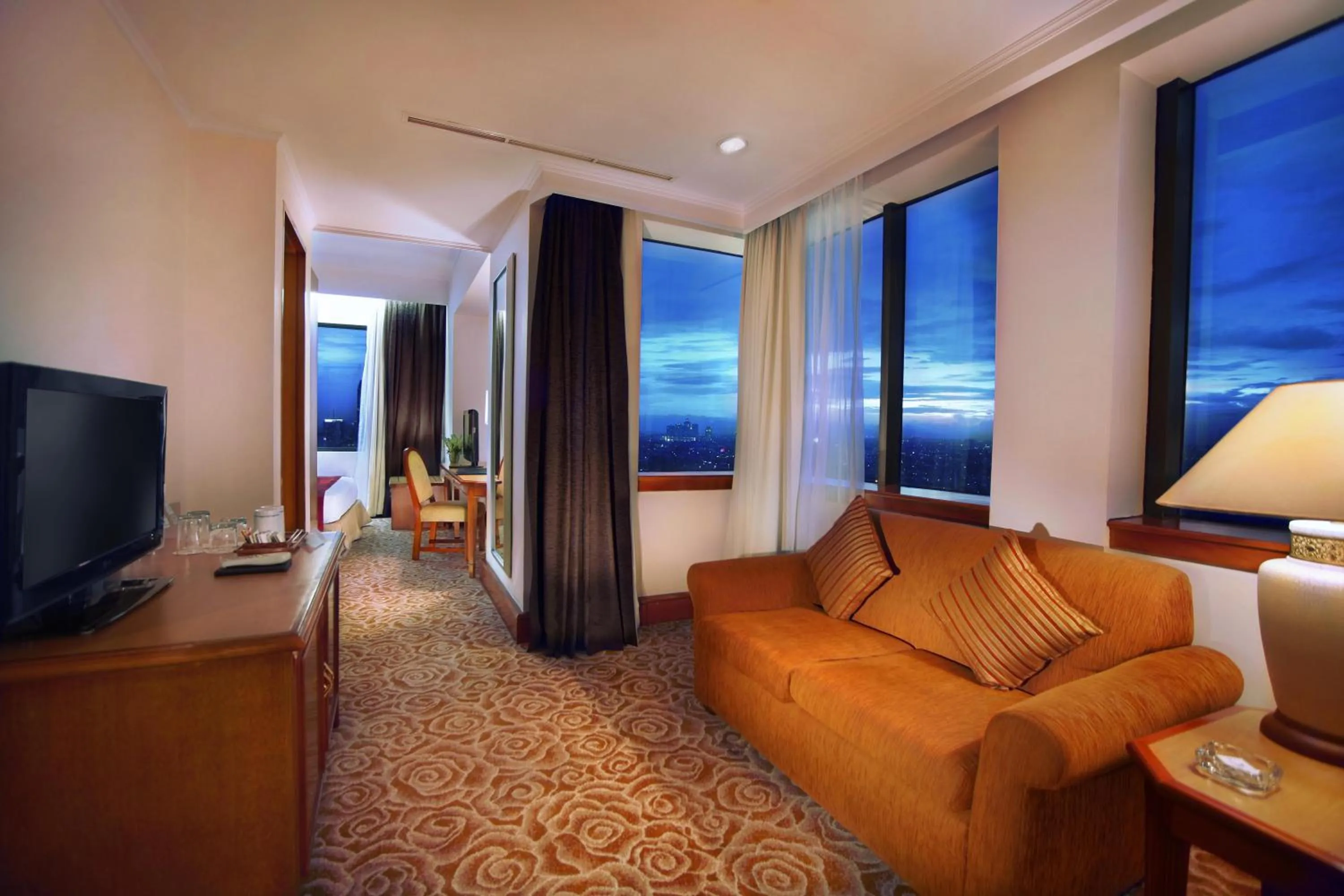 Living room in Menara Peninsula Hotel