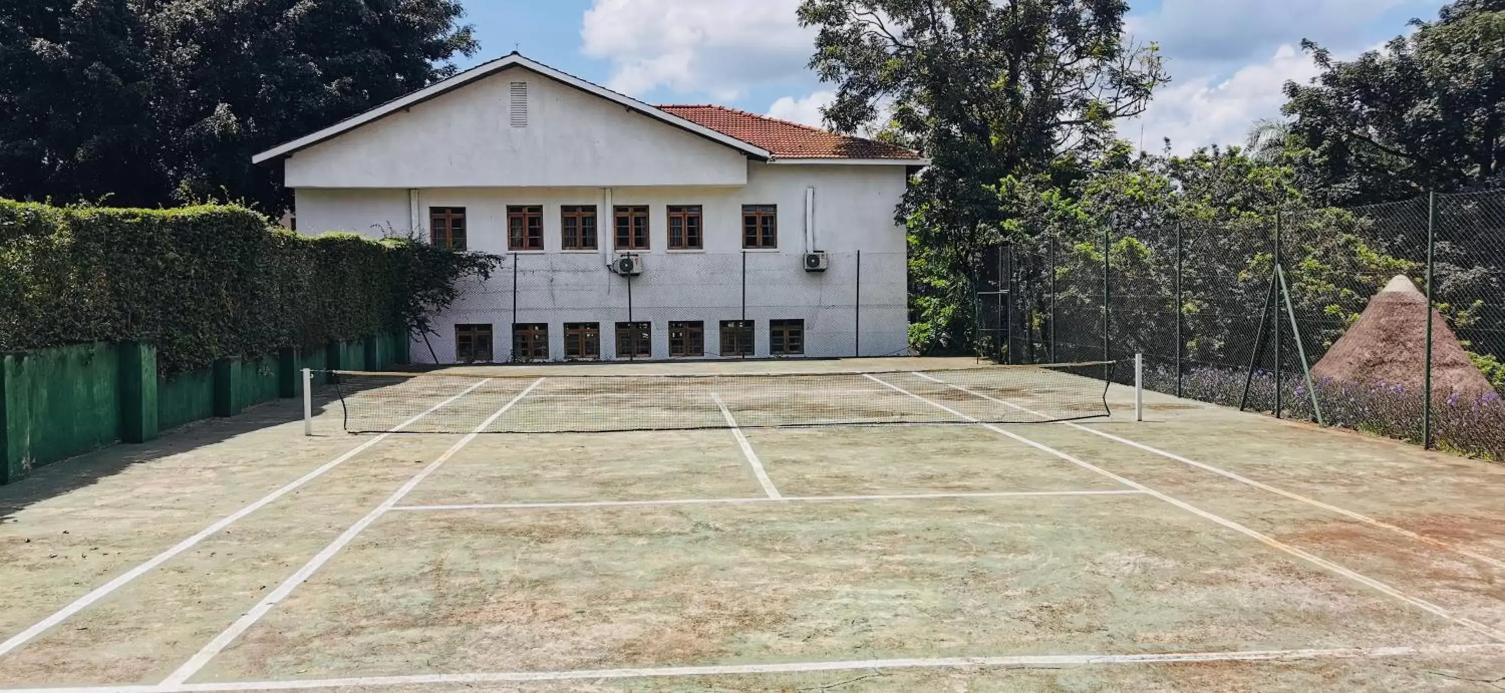 Tennis court, Property Building in Jinja Nile Resort