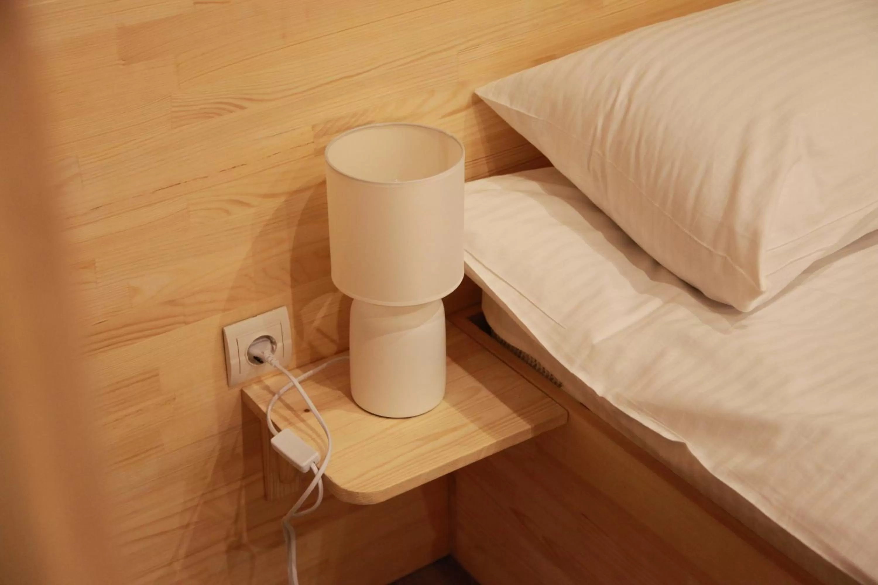 Bed in WINE & ROSE BOUTIQUE HOTEL