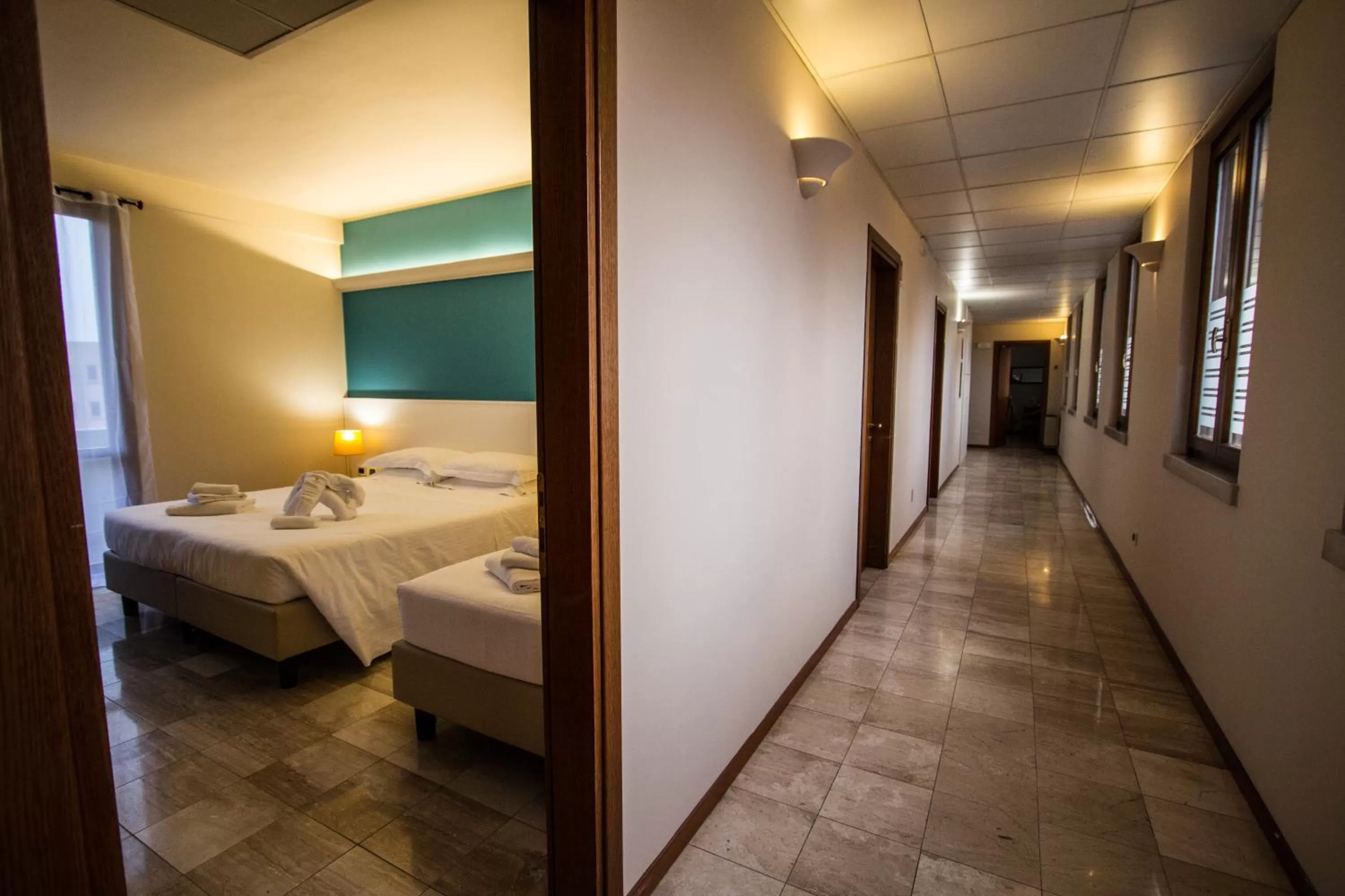 Bed in Hotel Elefante